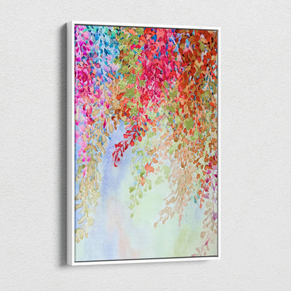 Vibrant watercolor floral canvas art with cascading pink red blue green blossoms in white frame