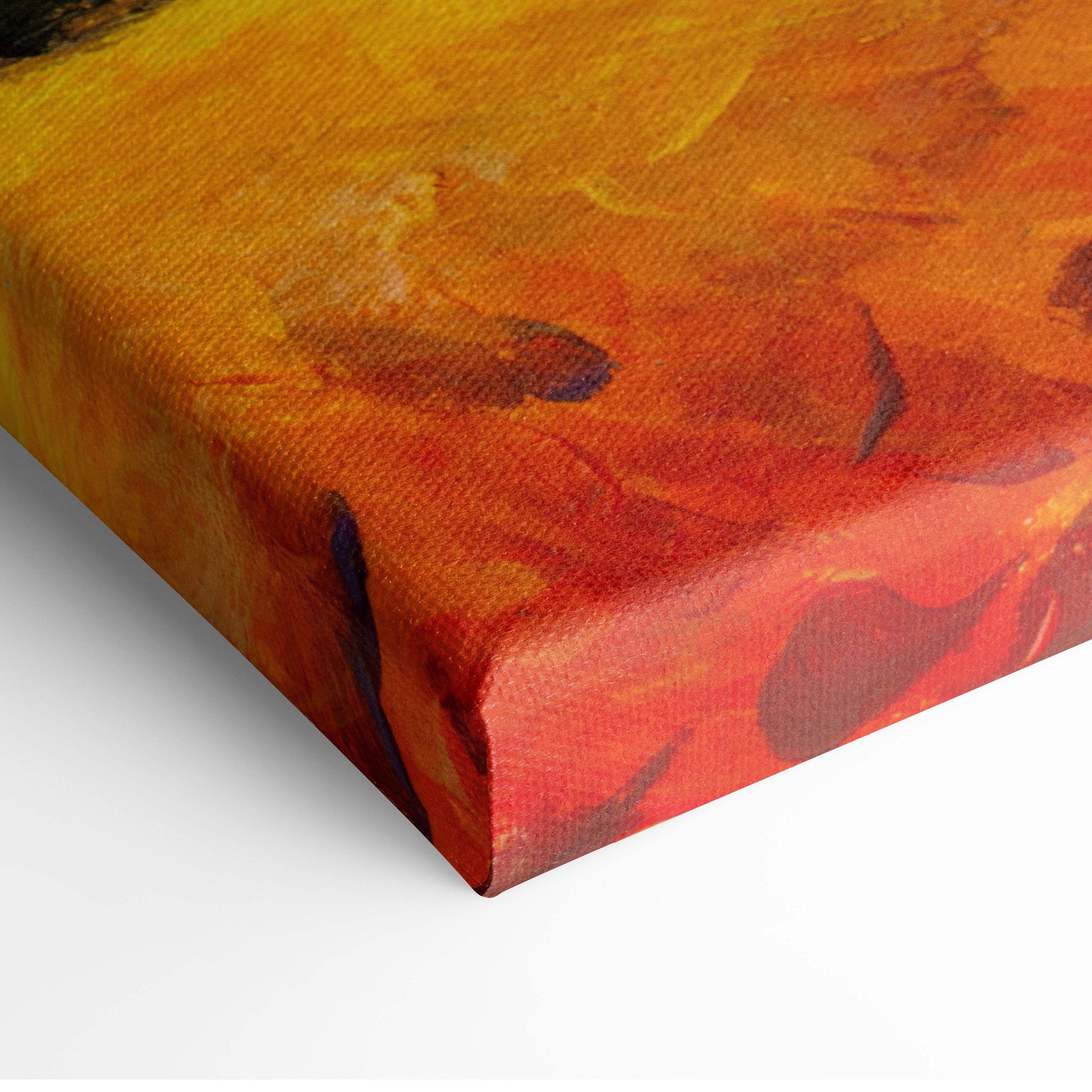 A vibrant abstract canvas painting with bold orange red and yellow strokes on textured fabric for rustic farmhouse decor