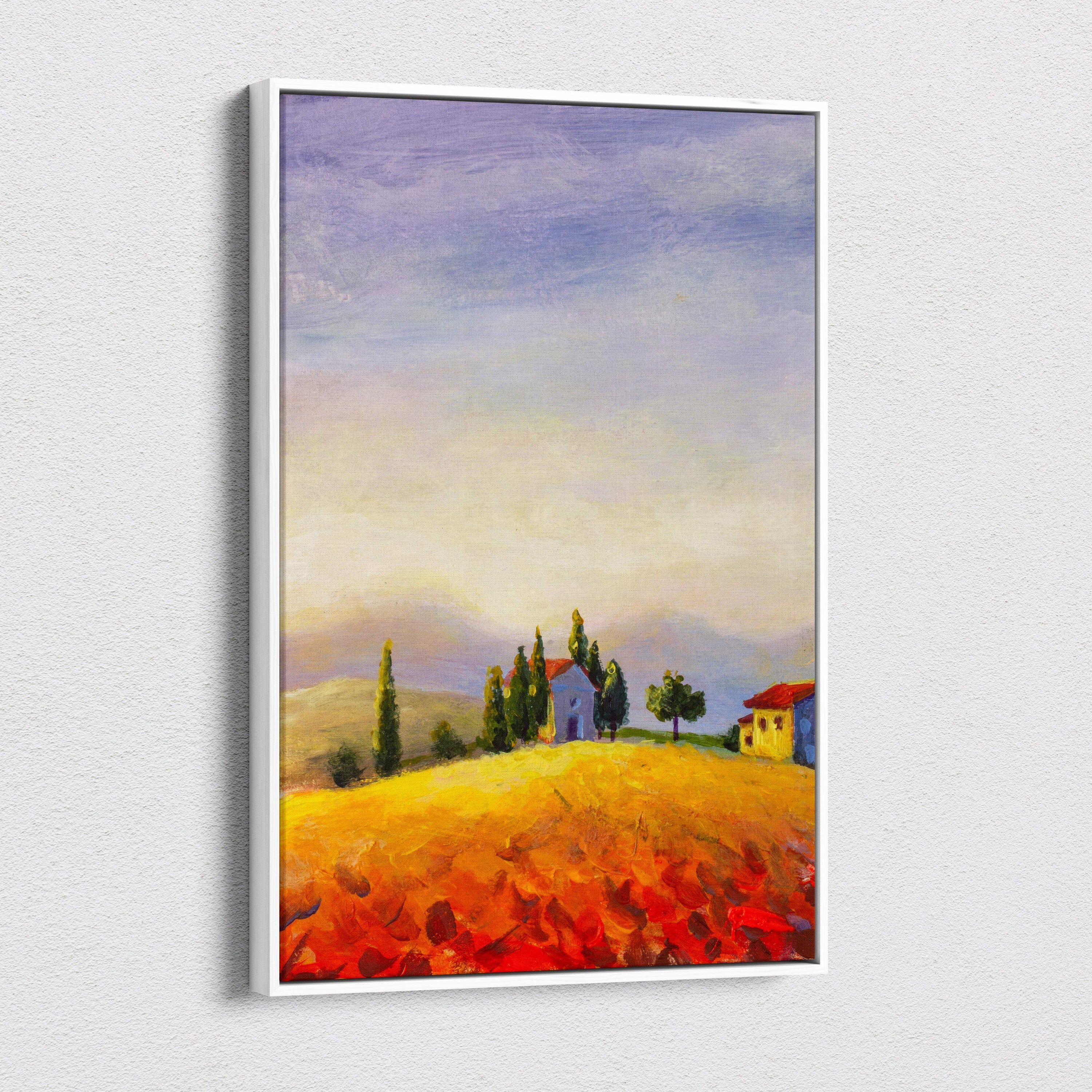 A framed canvas print of a tuscan countryside landscape with golden fields red roof houses and a soft purple sky