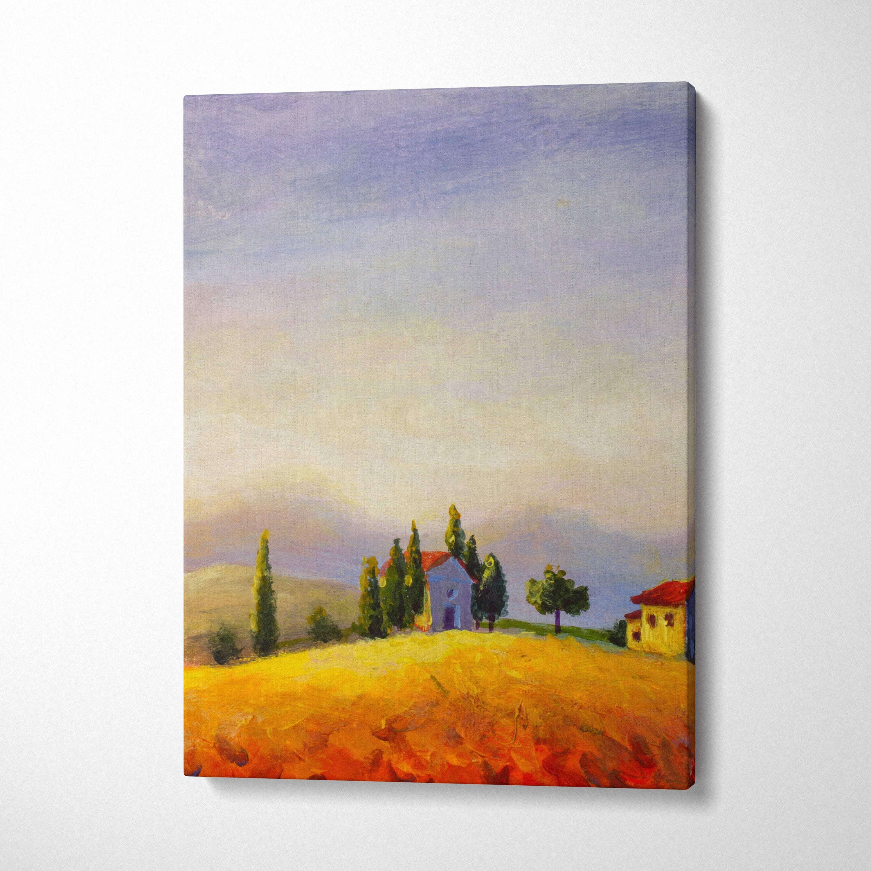 Tuscan countryside landscape canvas print of golden fields with blue and yellow houses and cypress trees under pastel sky