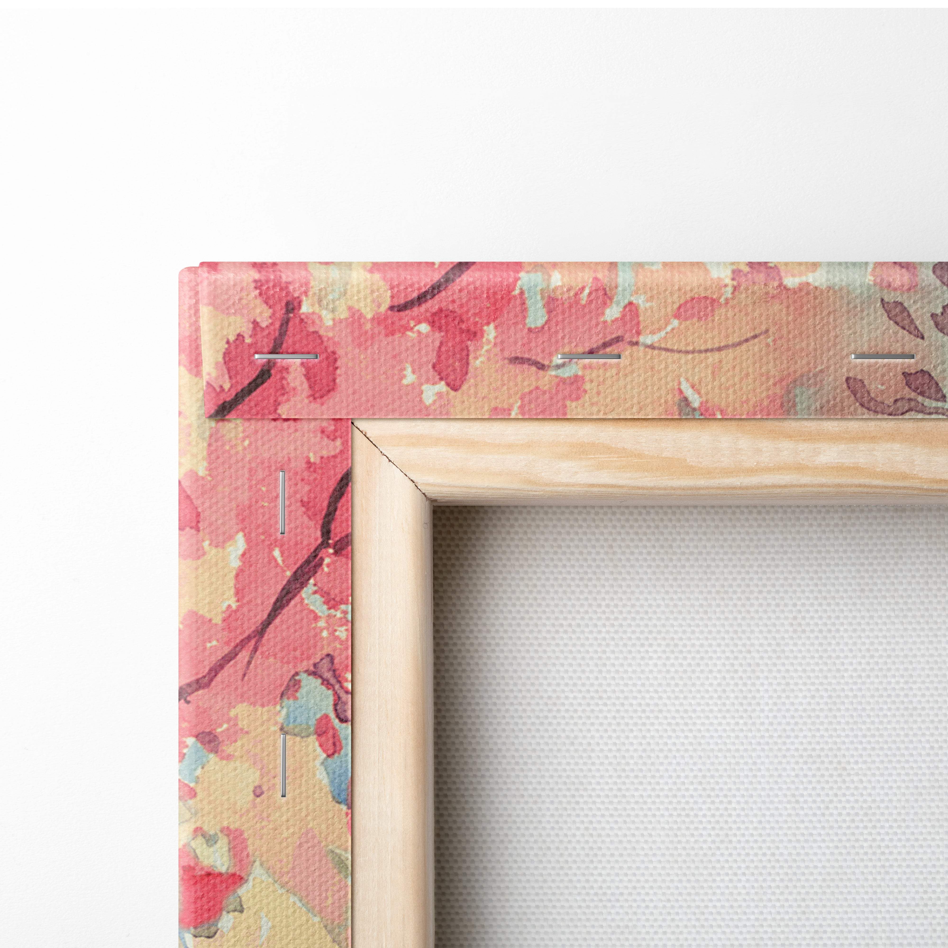 A wooden-framed canvas wall art with vibrant pink and peach floral pattern for peaceful spring decor