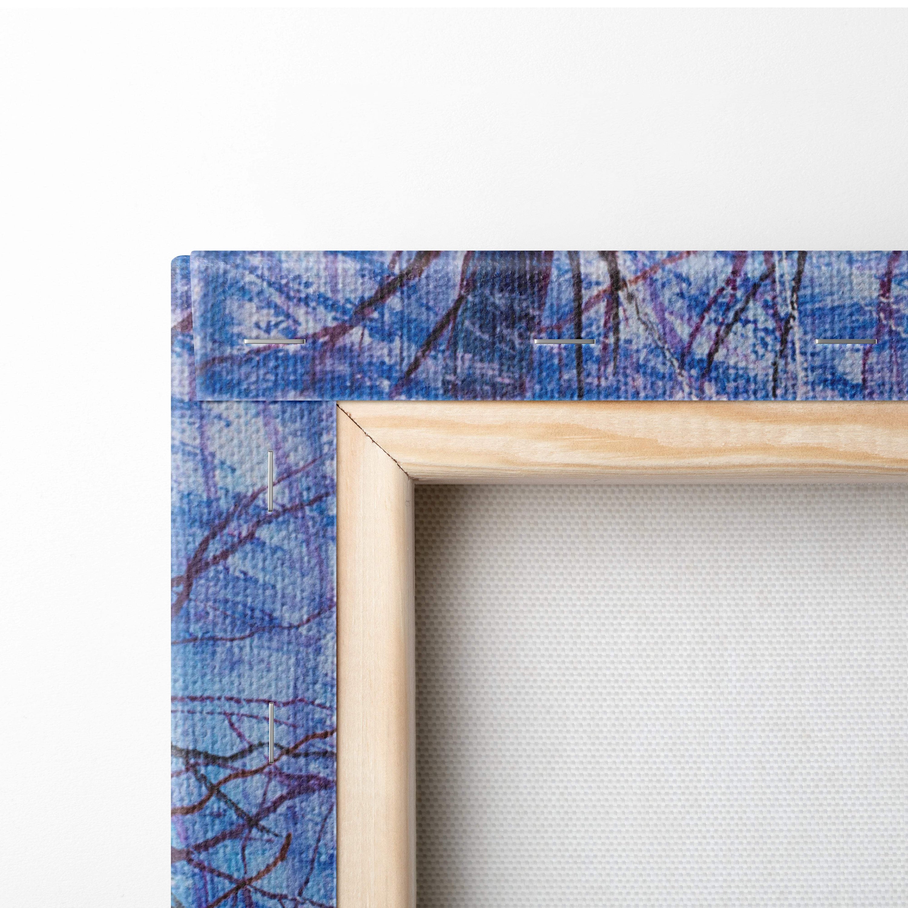 A wooden frame with a blue and purple abstract fabric border for winter sunrise forest painting style wall art canvas print