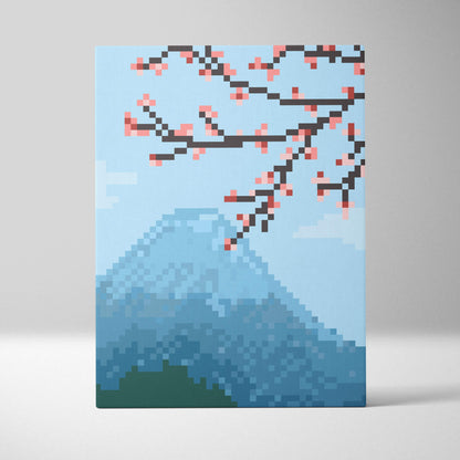 Pixel-art canvas print of a snow-capped mountain with pink cherry blossom branches against a light blue sky