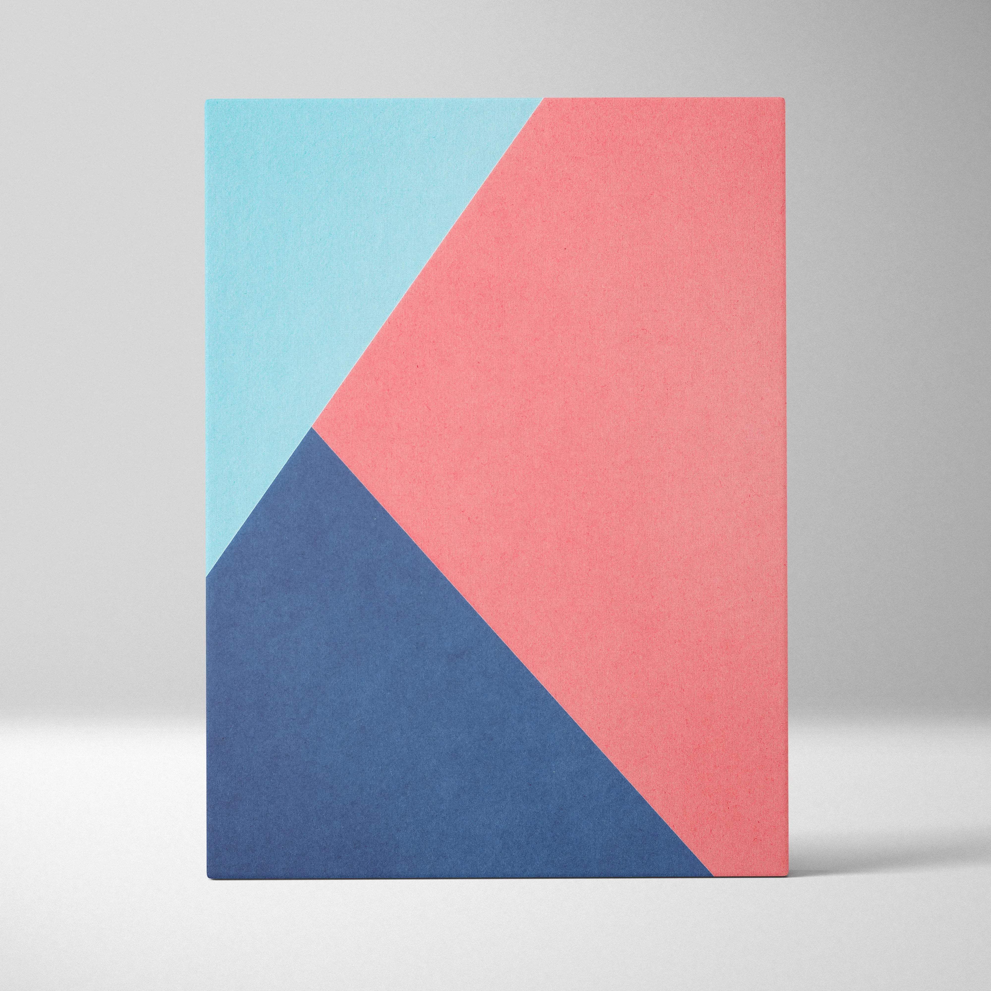 Minimalist geometric diagonal block canvas wall art in pastel blue coral pink deep navy