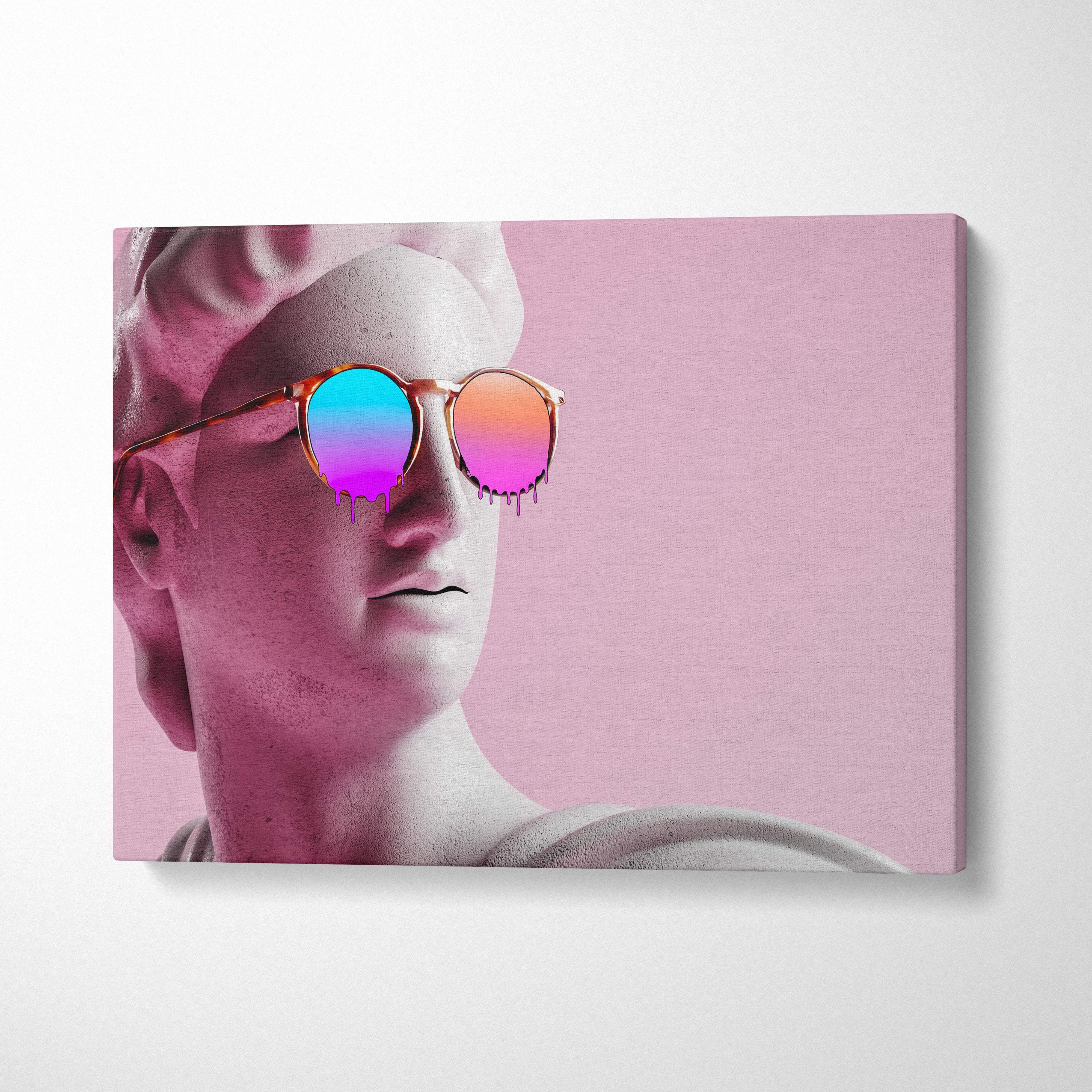 A canvas print of a white marble statue bust wearing round gradient blue and pink dripping paint sunglasses