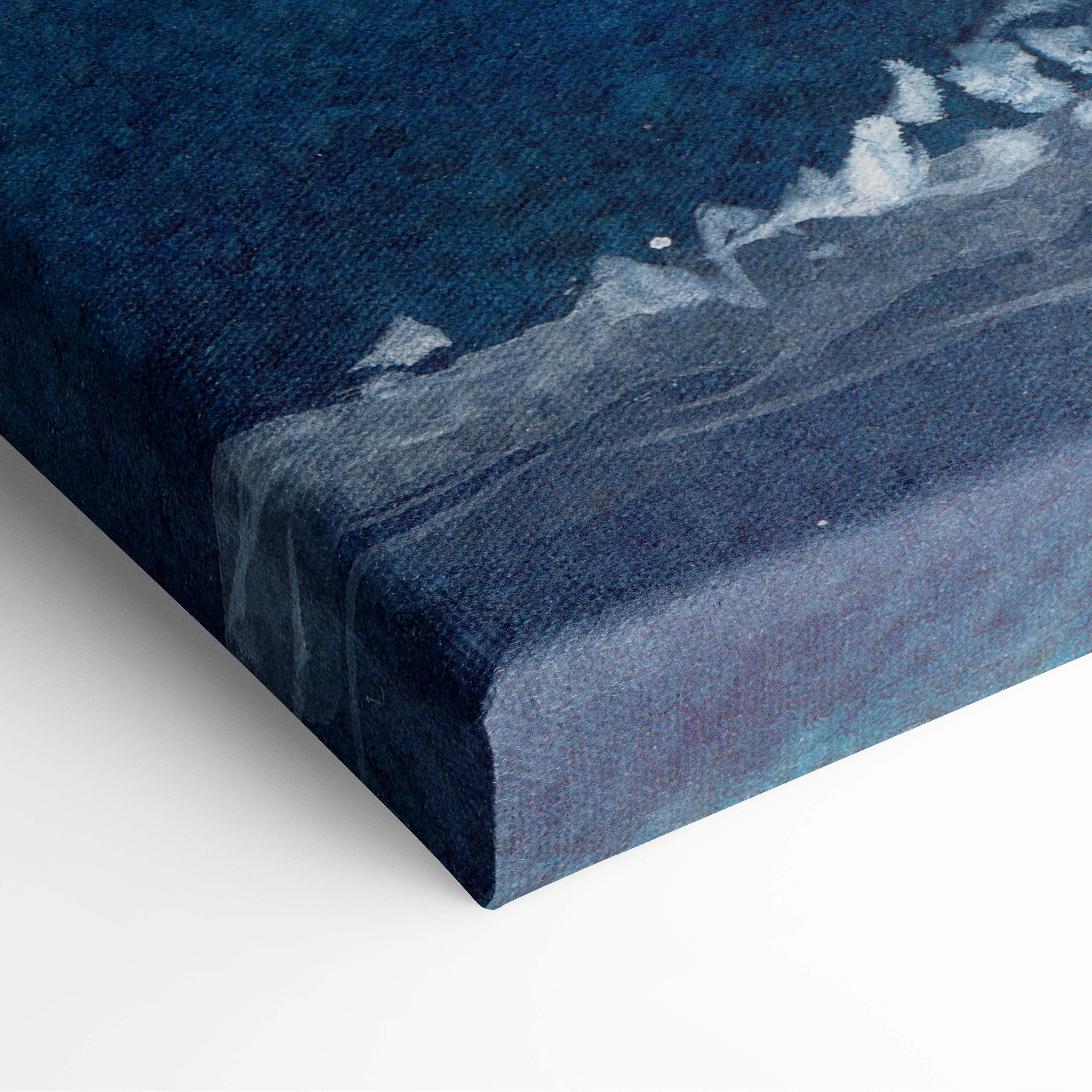 Deep blue canvas print of abstract ocean waves with textured teal and white highlights for coastal wall decor