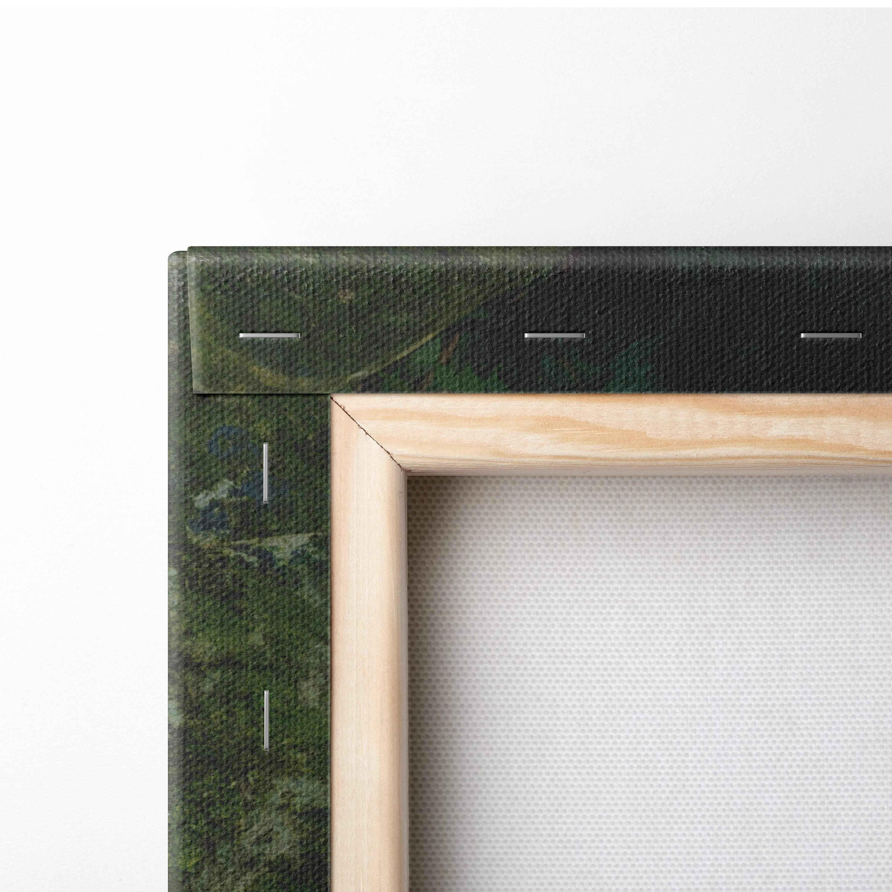 A framed motivational river canvas wall art with dark green textured stitching in a light wood frame for nature decor