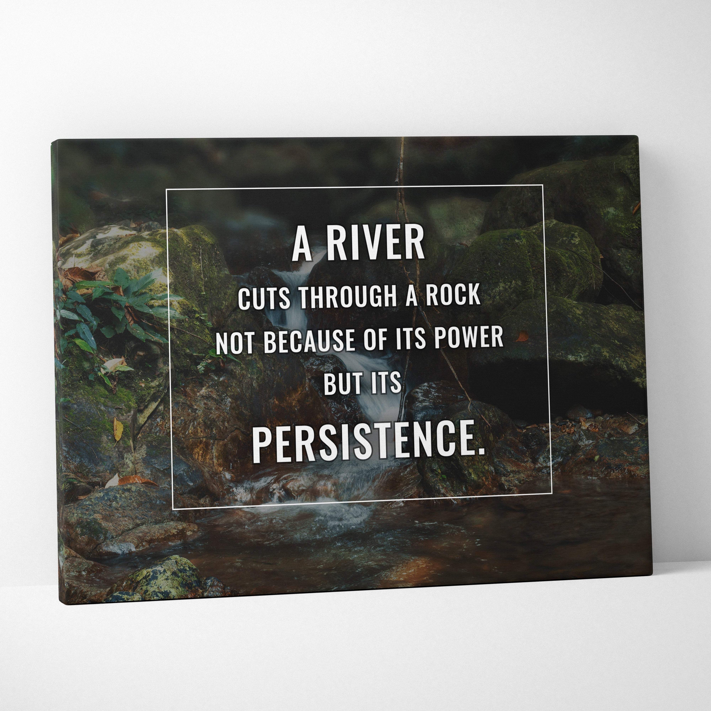 Black canvas print with mossy rocks and river scene featuring a persistence inspirational quote for nature décor