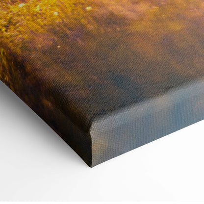 Canvas print of golden meadow unicorn with textured rust-colored abstract design in dreamy fantasy landscape wall art
