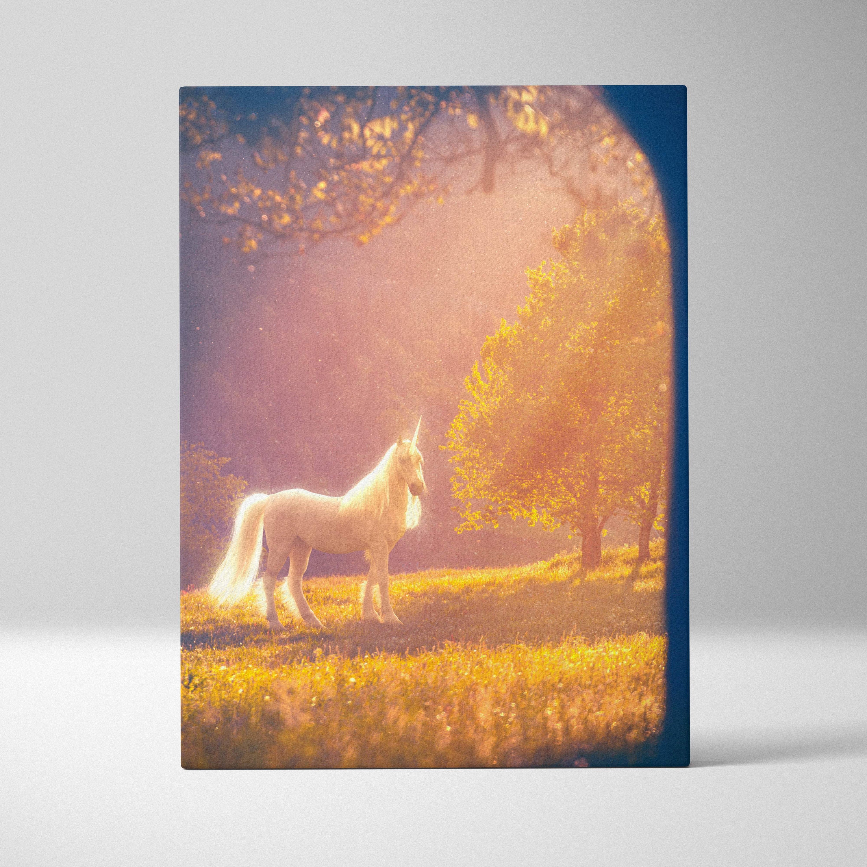 Rectangular canvas print of a white unicorn in a golden meadow with sunlit trees for dreamy fantasy wall art