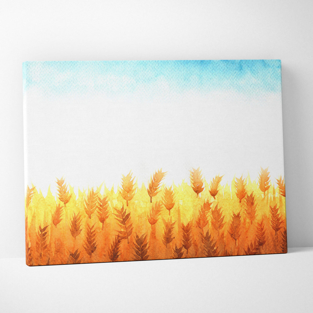 Watercolor wheat field in golden orange hues under soft blue sky canvas print