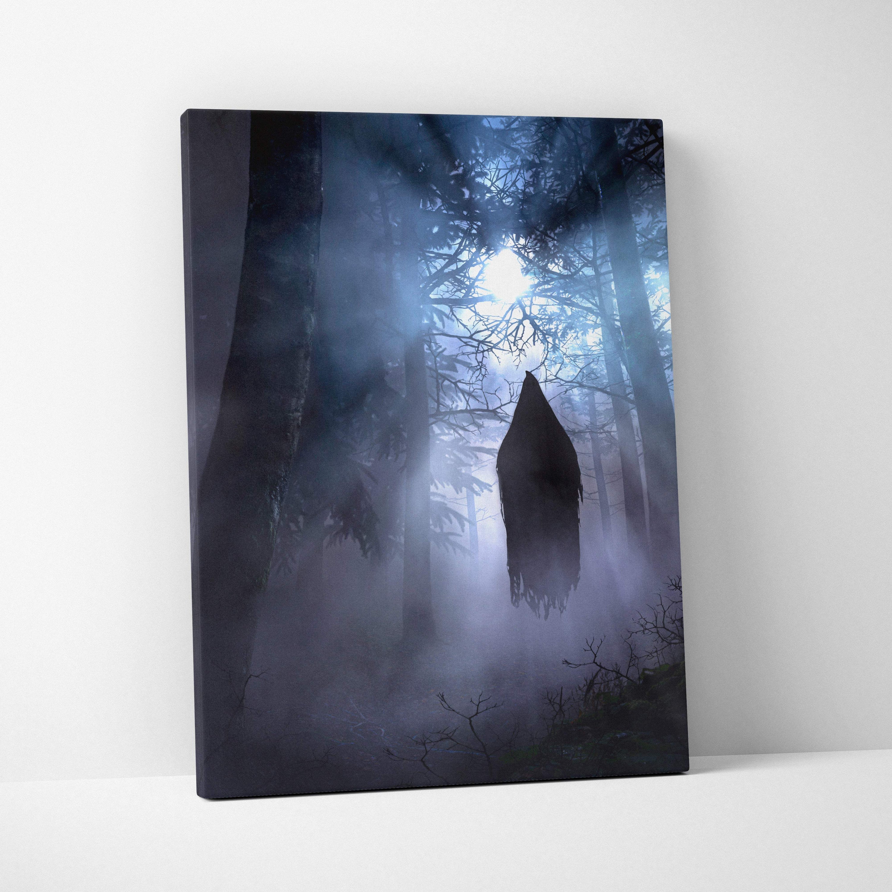 Haunted forest apparition canvas print featuring a dark misty forest with a floating hooded ghost in blue light