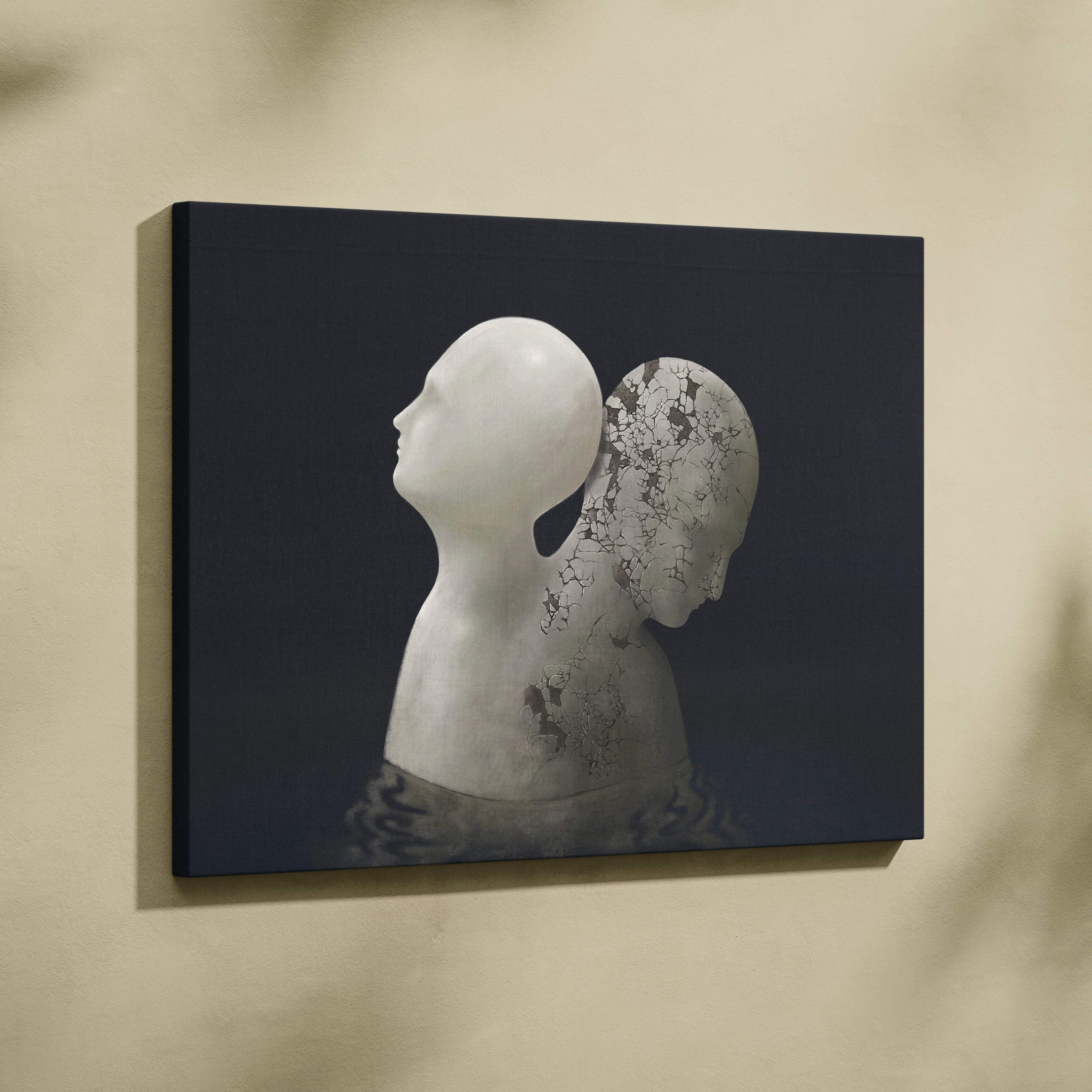 Black canvas print with two white sculpted heads in profile one smooth and one cracked for moody abstract decor