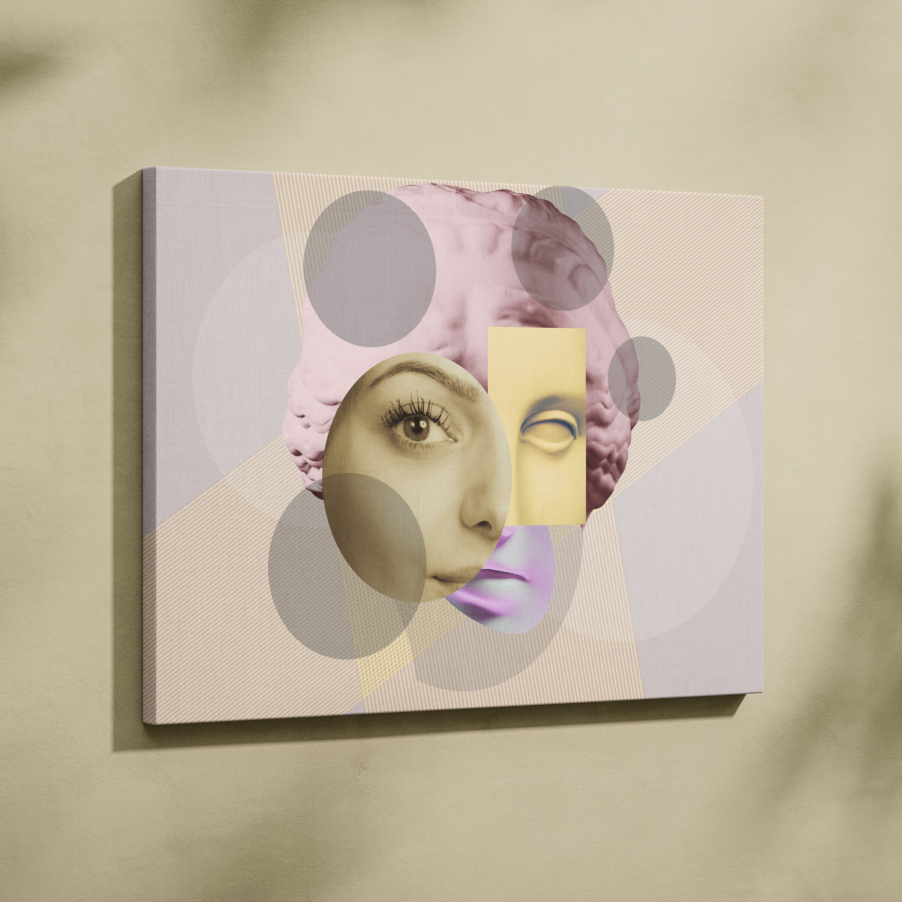 A modern abstract canvas wall art print featuring a surreal face collage in soft pink and yellow tones for eclectic bedrooms