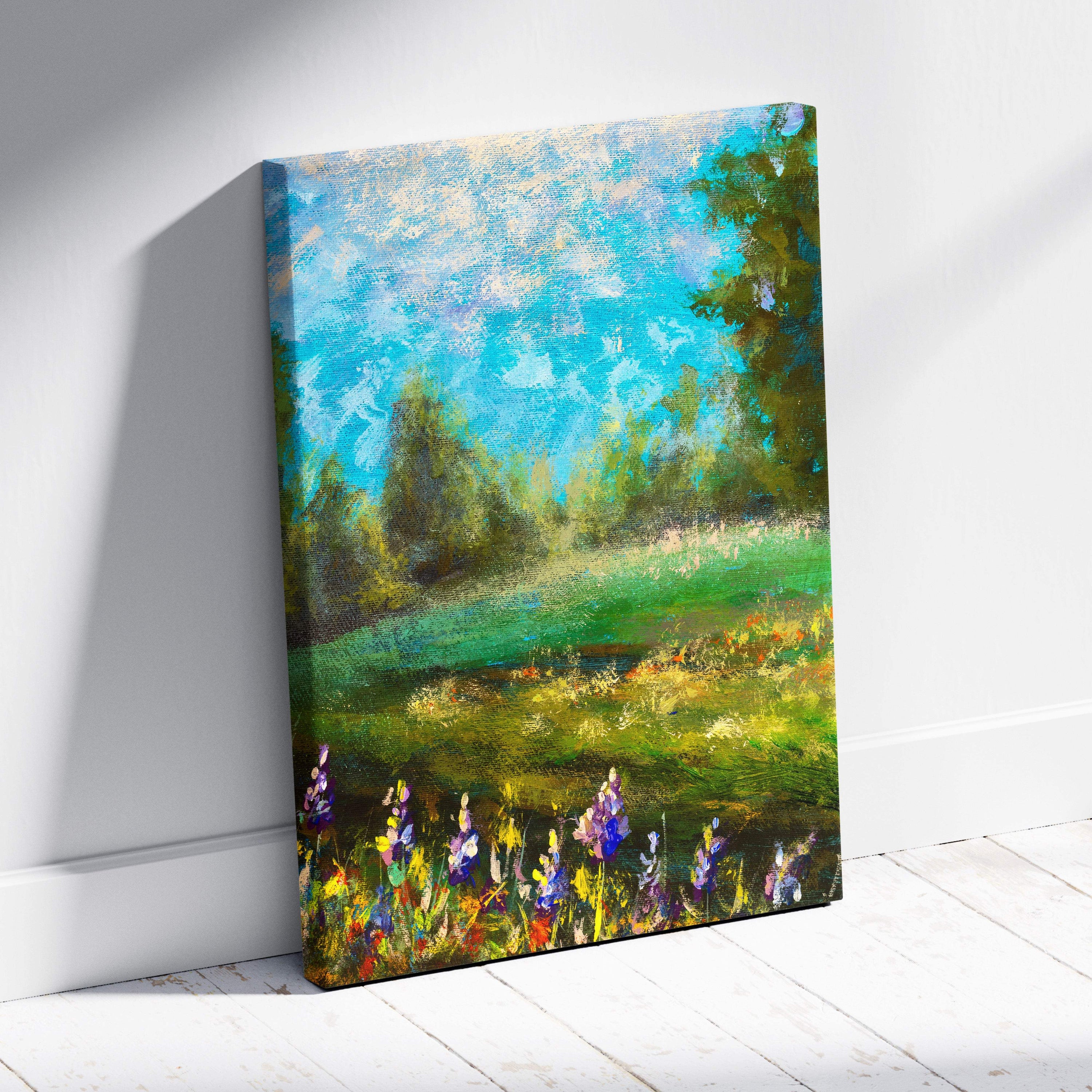 Green meadow landscape canvas print featuring sunlit meadow with purple and yellow wildflowers and bright blue sky