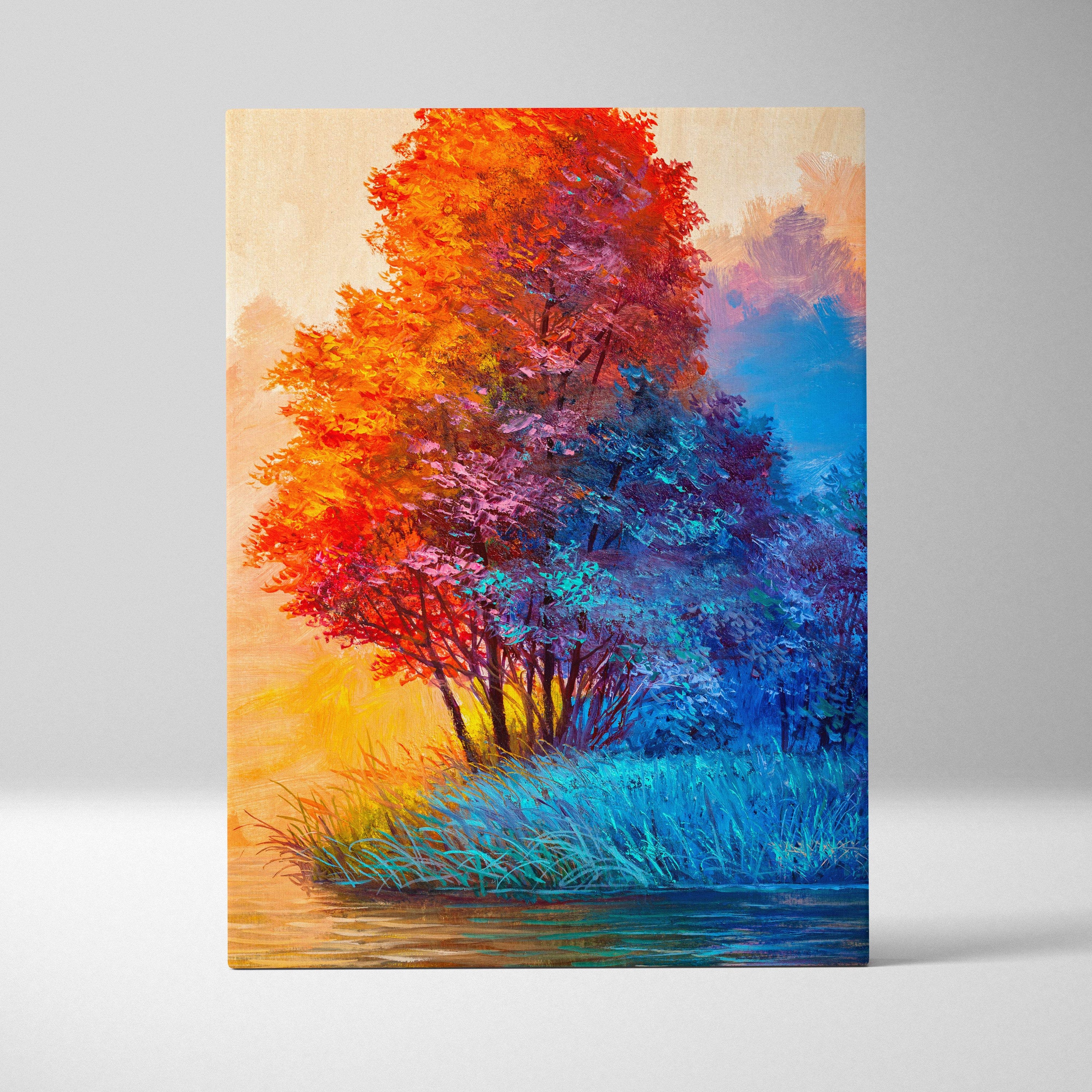 Colorful abstract tree landscape canvas print with fiery red orange and blue foliage and reflective water in oil painting style
