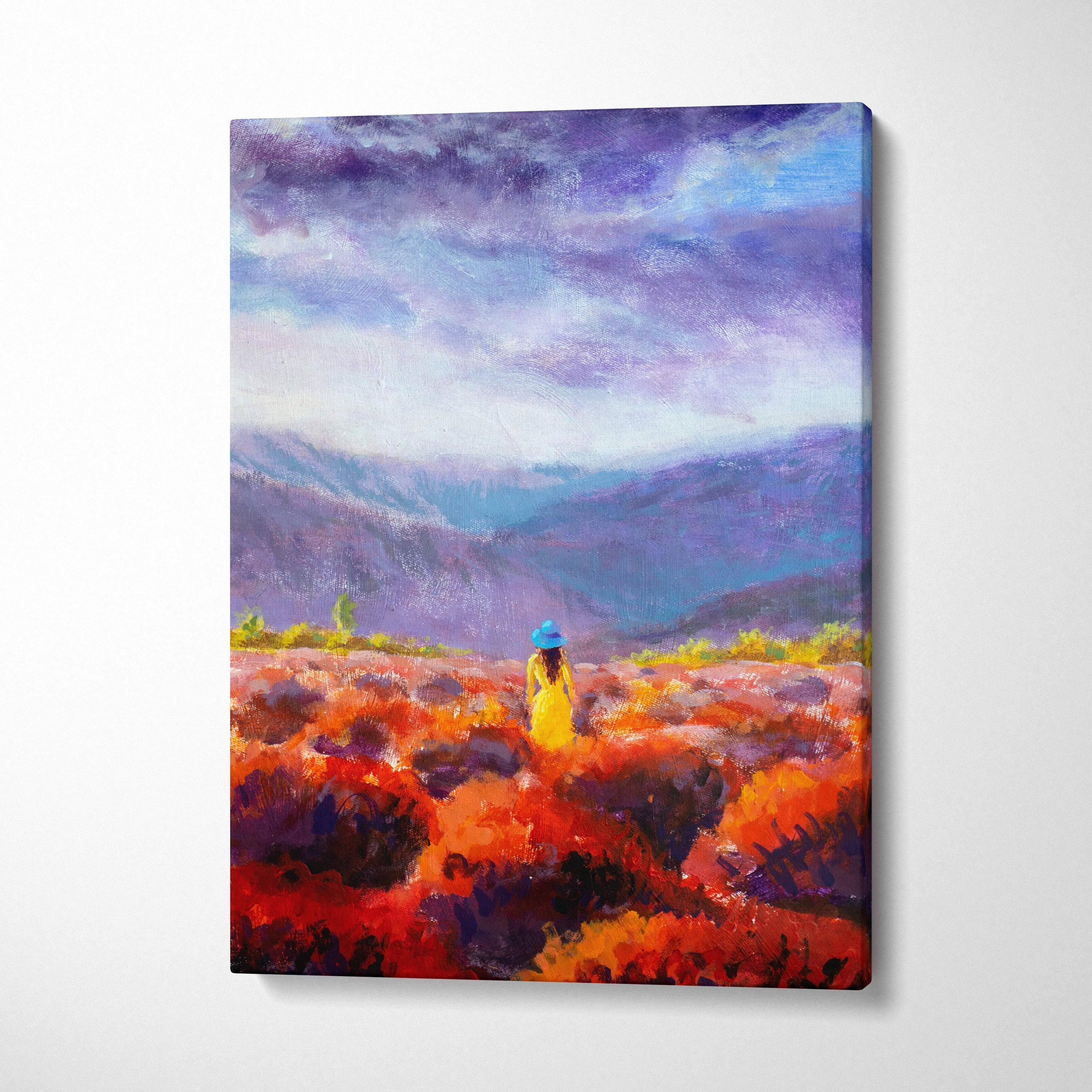 Vibrant meadow landscape canvas print featuring a lone woman in a yellow dress in fiery red orange fields under a dramatic sky