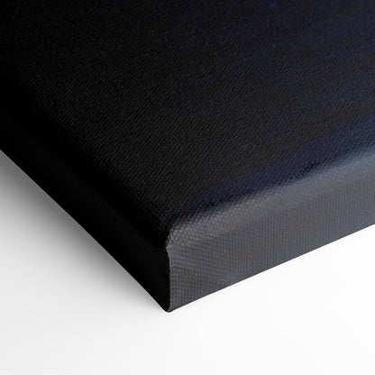 Black canvas wall art print with textured surface and raised edges glowing blue portal digital decor