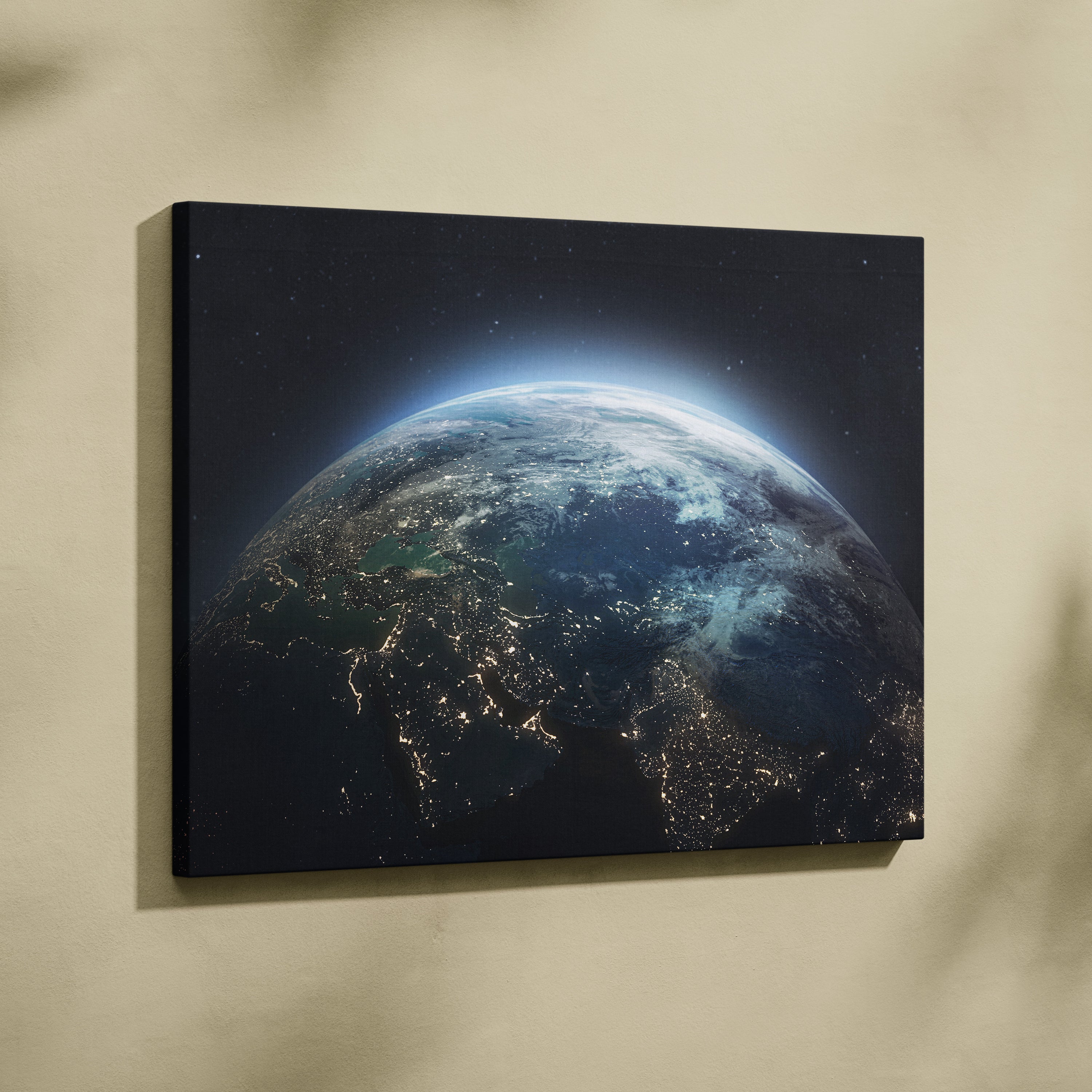 Black canvas print featuring earth from space illuminated by city lights blue planet wall art for modern interiors