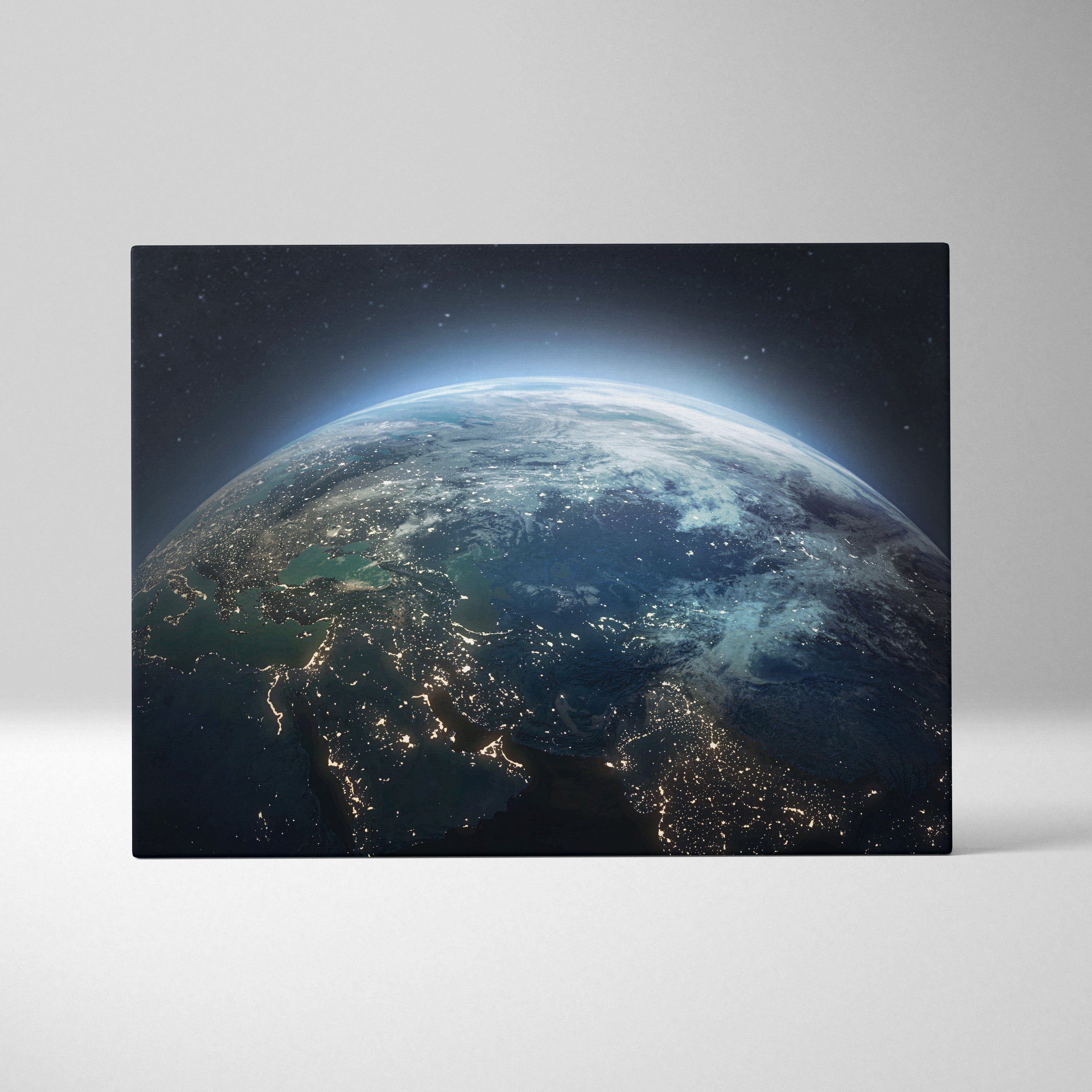 Rectangular canvas print showing earth from space with blue planet city lights and glowing atmospheric rim for modern decor