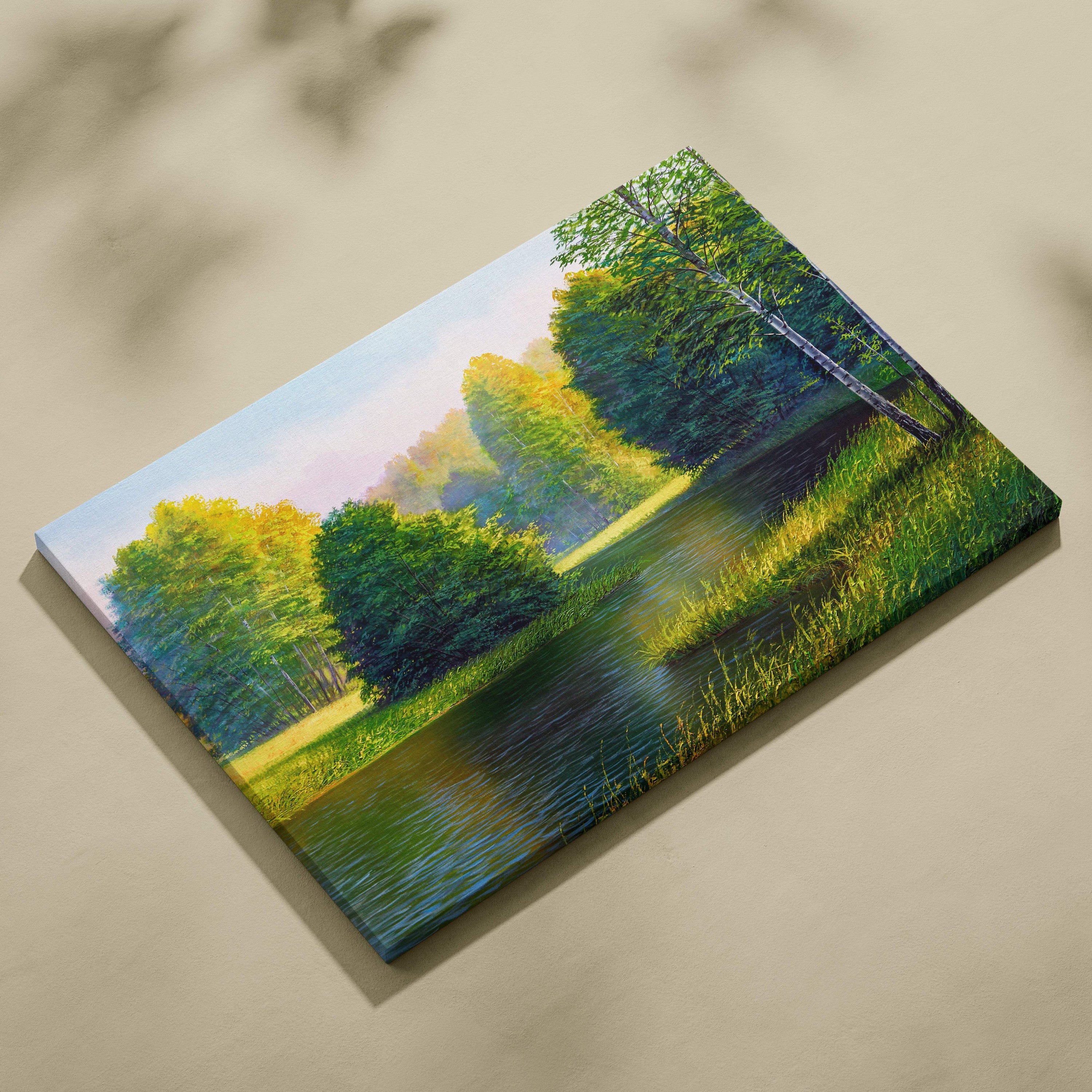A vibrant canvas print of a sunny river landscape with lush green trees and golden sunlight filtering through foliage