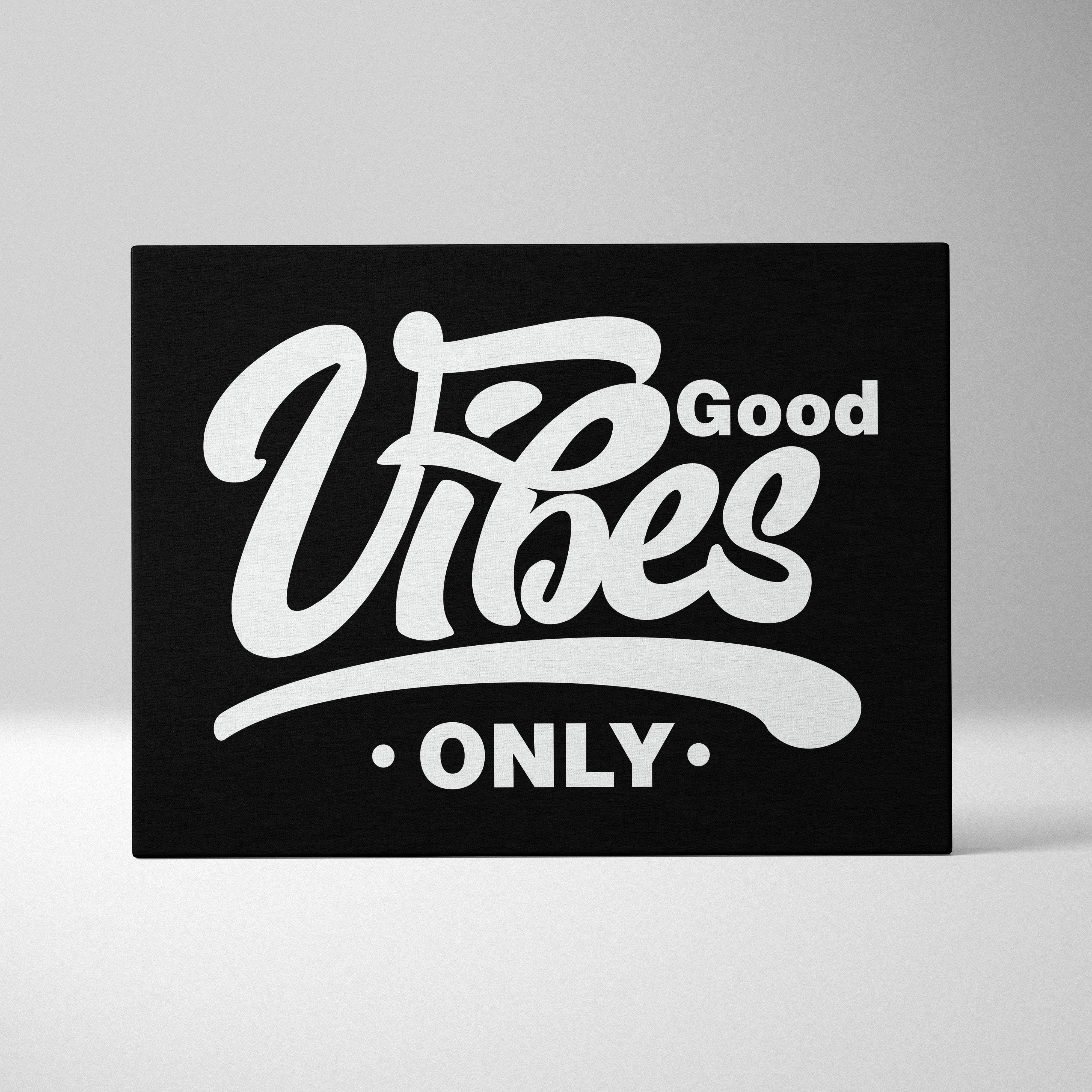 Black canvas print with good vibes only in bold white script and block lettering motivational wall art for home or office
