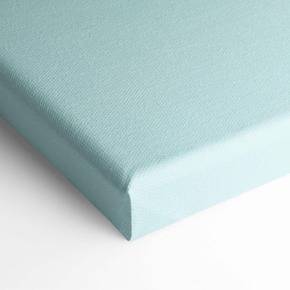 A soft mint green canvas with a textured woven surface and clean rounded edges from contemporary lone figure wall art