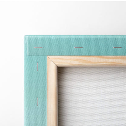 Contemporary lone figure teal canvas wall art with light wood border featuring a minimal aqua landscape print