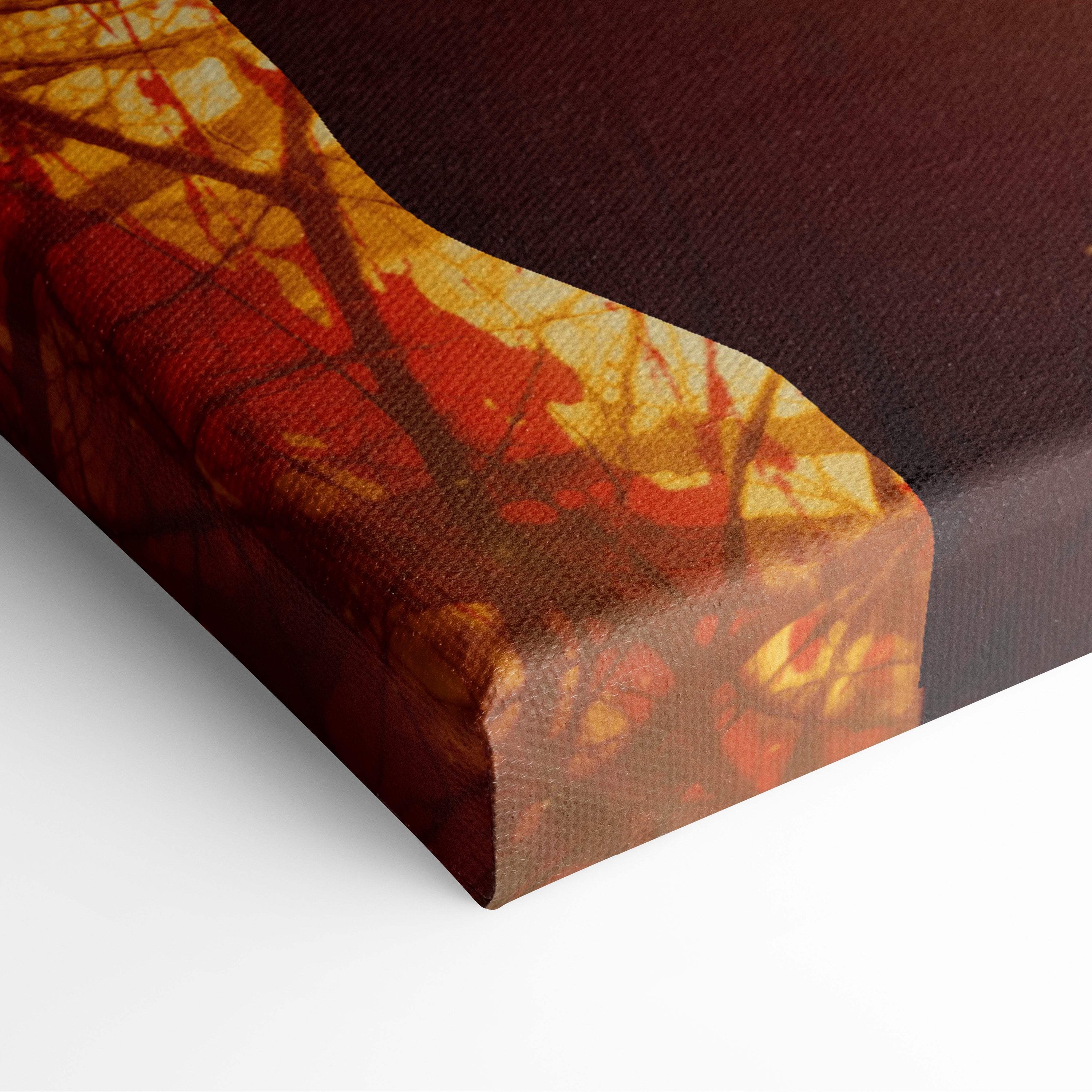 Canvas print featuring a vibrant autumn scene with fiery red and golden leaves on dark branches in a deep brown frame