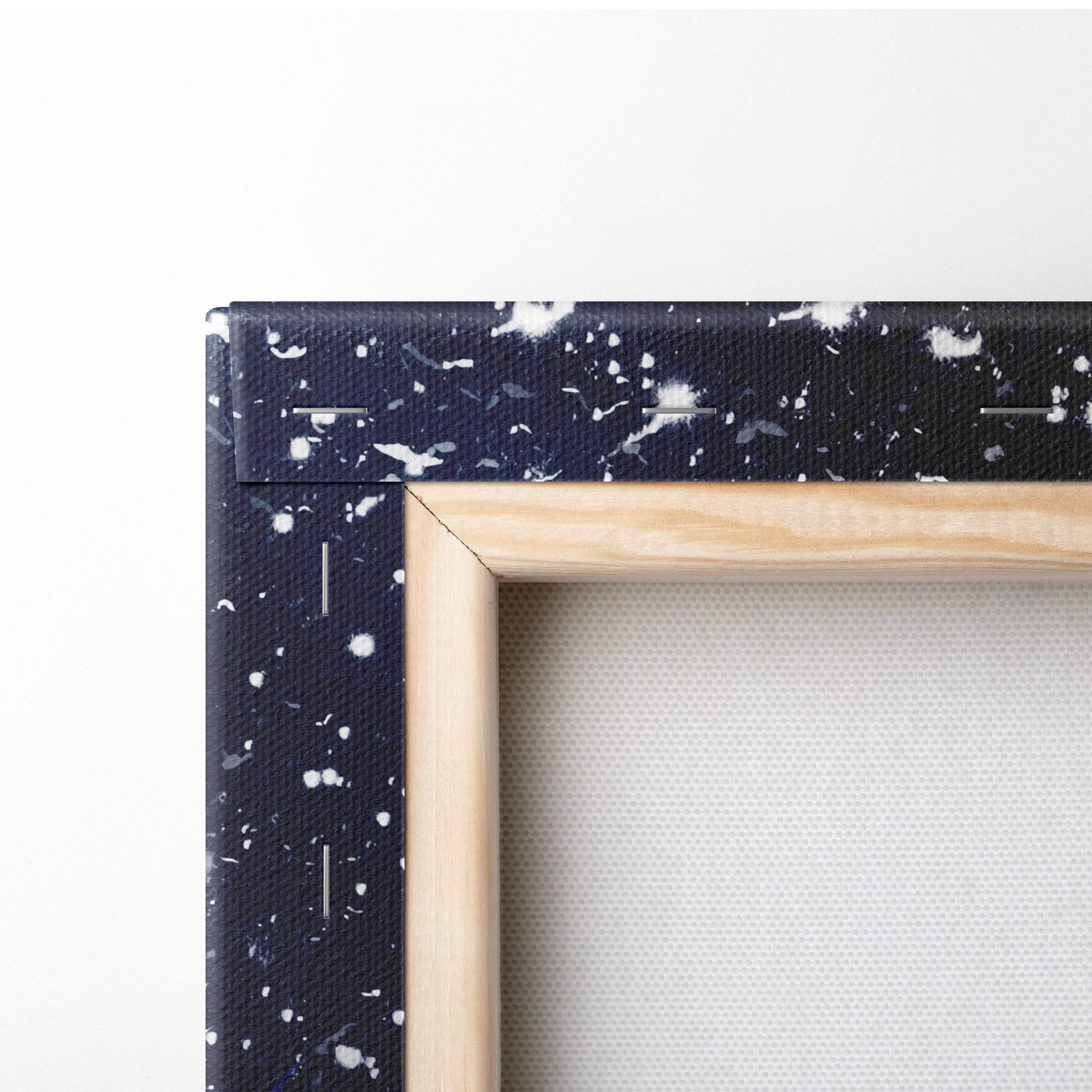 Snowy night girl canvas wall art print with black and white splatter design framed in light wood for cozy rooms