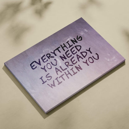 Purple gradient canvas wall art with motivational typography saying everything you need is already within you in black lettering