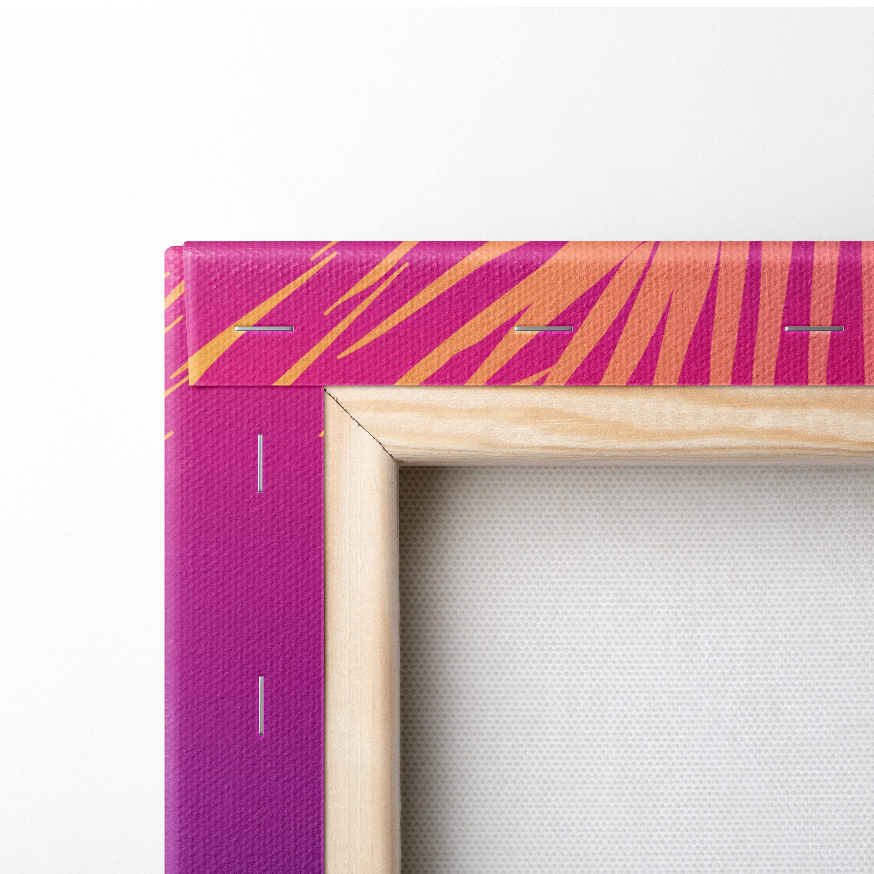 Vaporwave palm leaf sunset canvas art print with vibrant fuchsia and orange zebra stripes in light wood frame