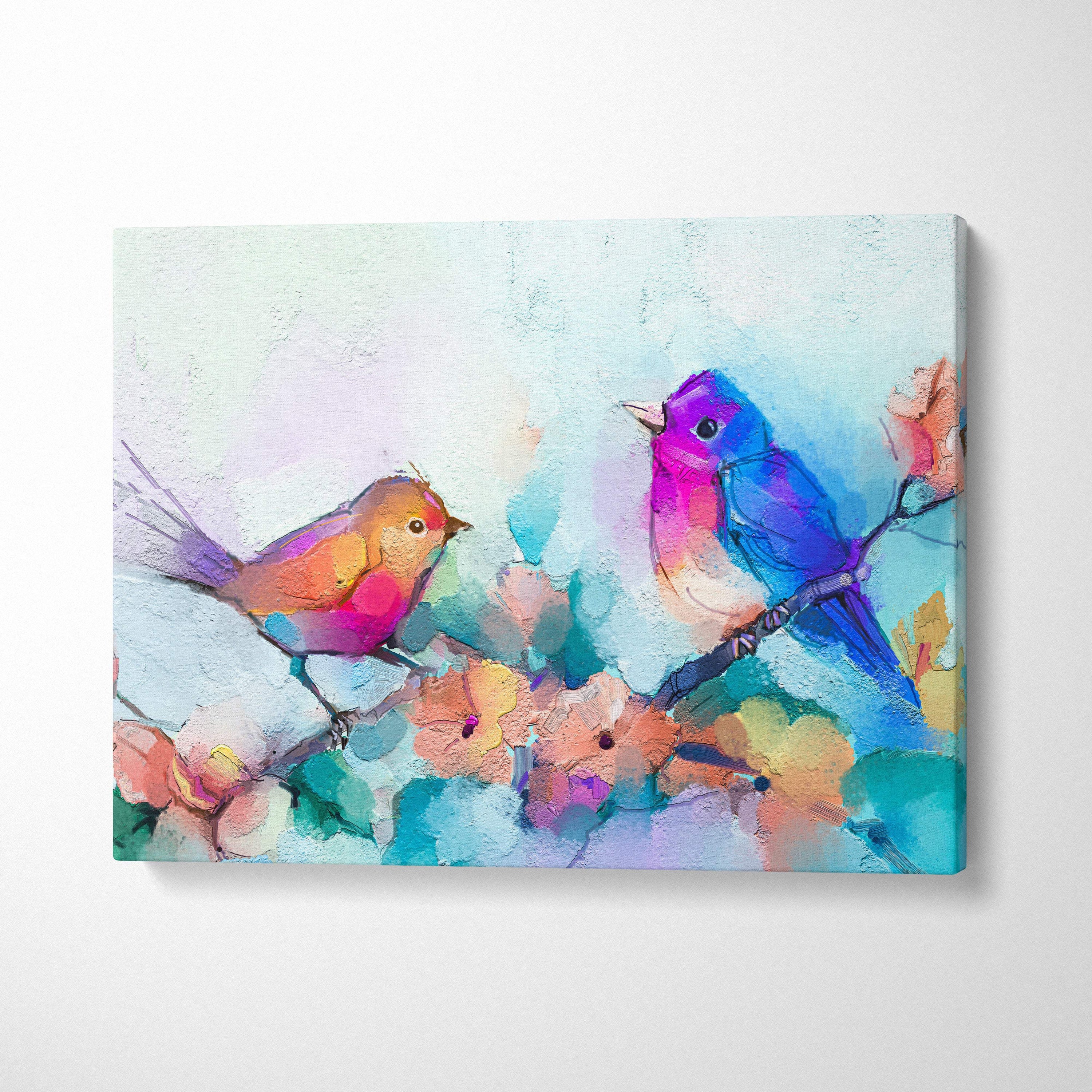 Colorful birds on blossom branch painting wall art featuring vibrant purple, blue, orange, and pink textured watercolor canvas