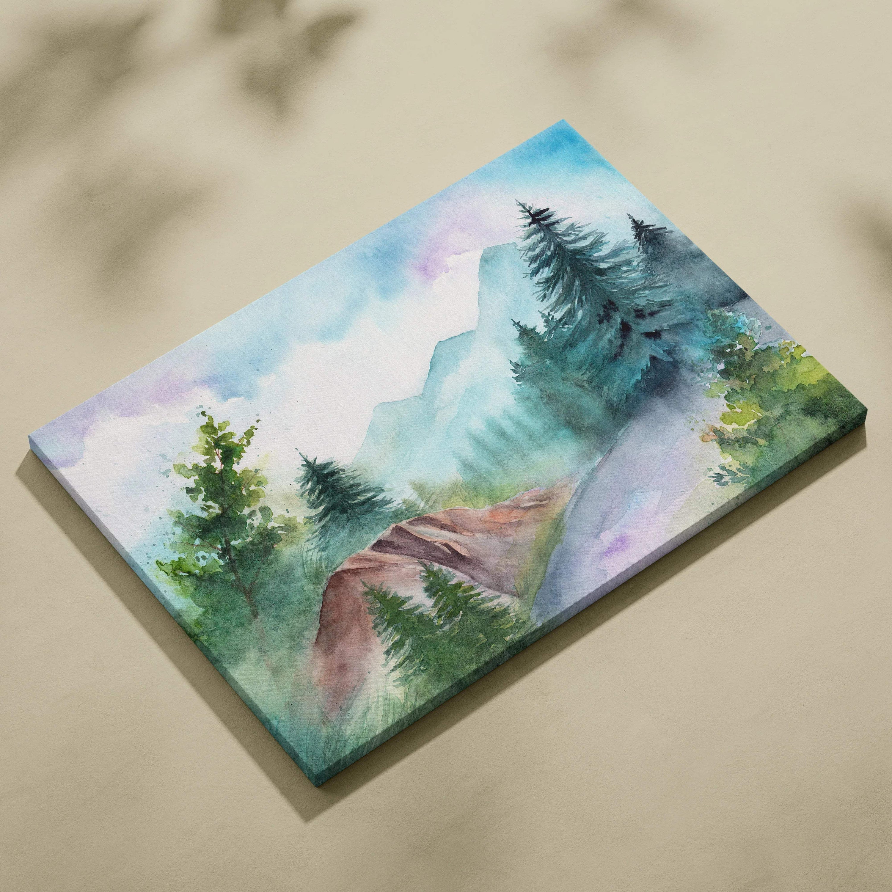 Misty mountain forest watercolor canvas wall art with soft blue green pines and pastel sky