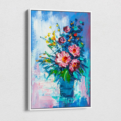 A vibrant floral still life canvas print of pink and yellow flowers in a blue vase with thick textured brushstrokes