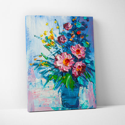 Vibrant floral still life canvas print featuring bold pink and yellow flowers in a deep blue vase with textured brushstrokes