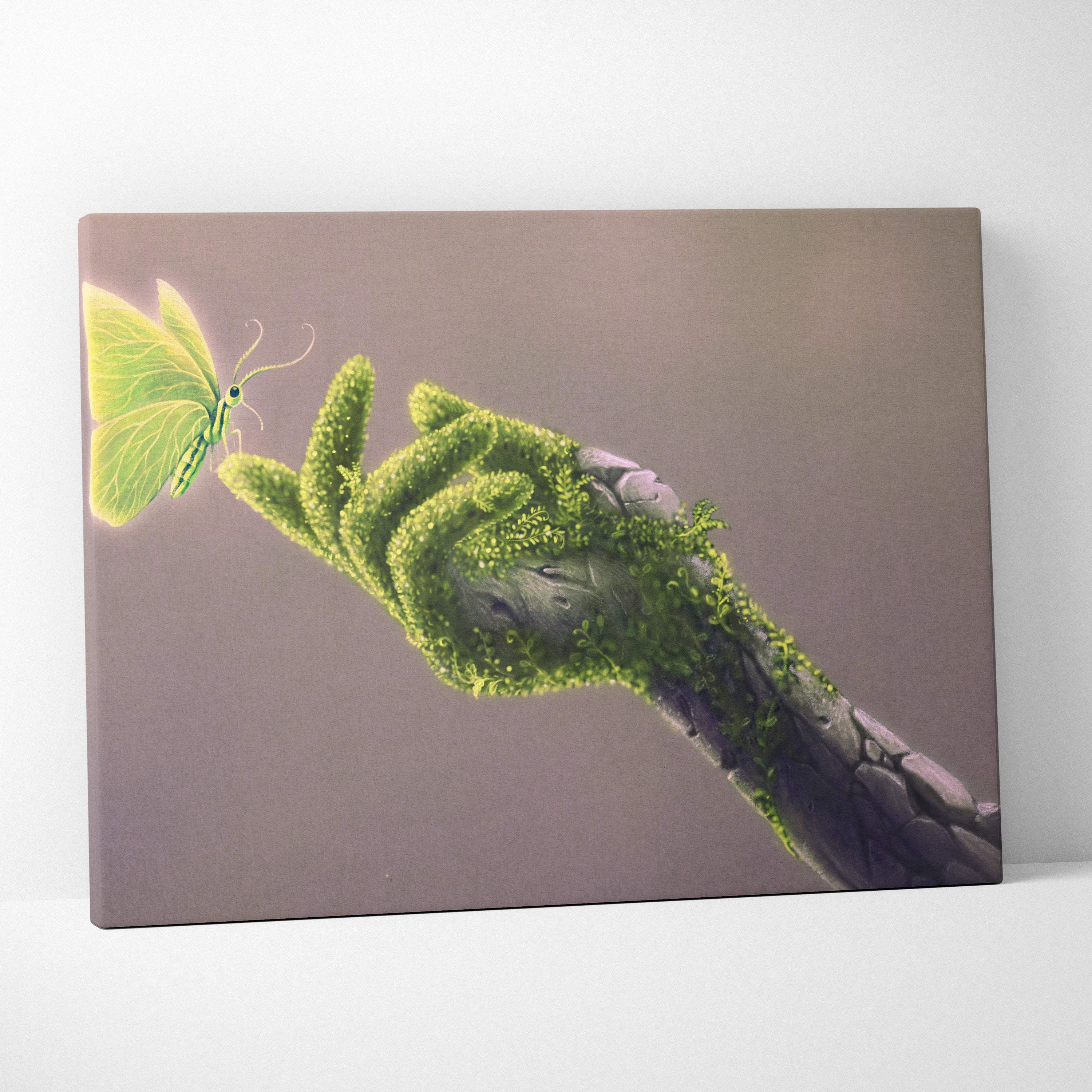 Contemporary green butterfly canvas wall art with a hand covered in vibrant moss reaching toward a glowing lime-green butterfly