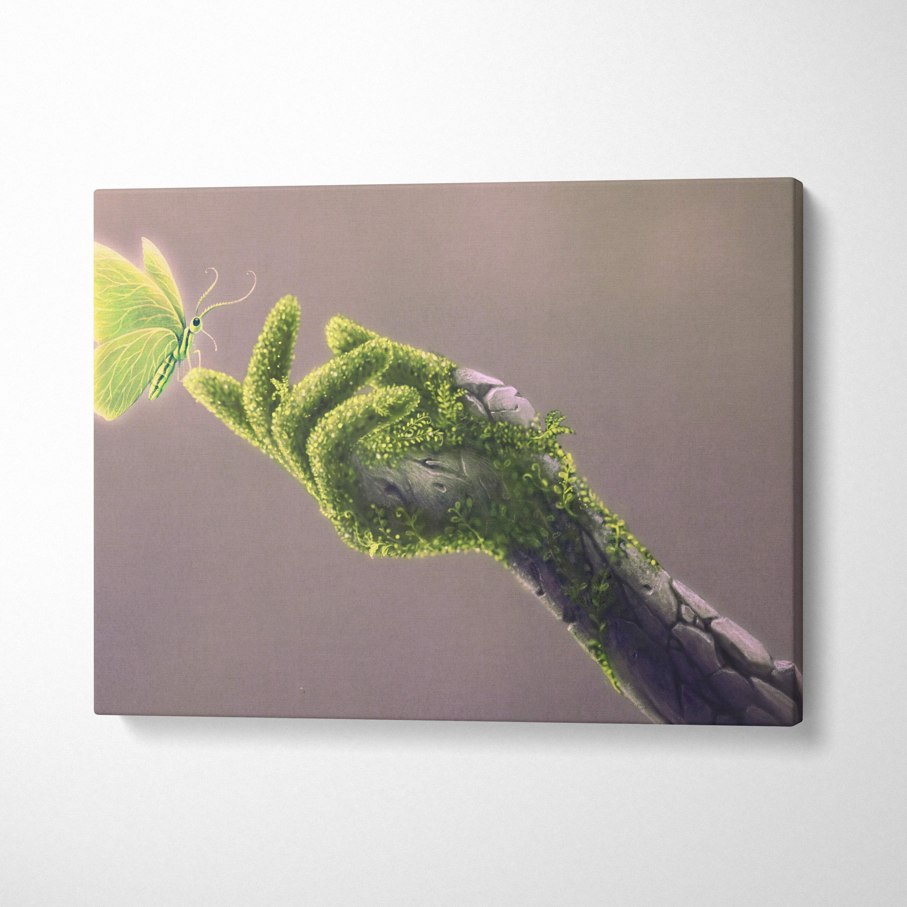 Contemporary green butterfly canvas wall art featuring a moss-covered hand reaching a glowing yellow butterfly