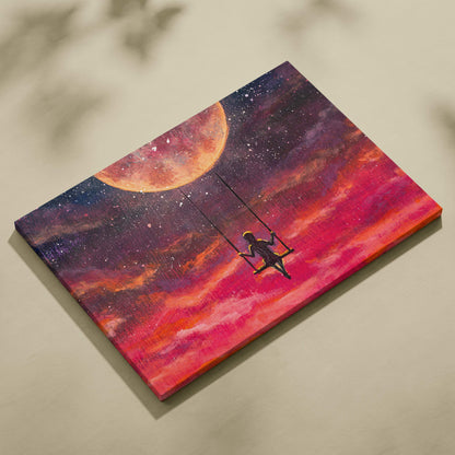 Vibrant canvas wall art of a girl on a swing silhouette under a glowing moon with a pink purple cosmic sky