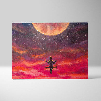 Vibrant canvas print featuring a silhouette of a girl on a swing under a large orange moon with swirling colorful clouds