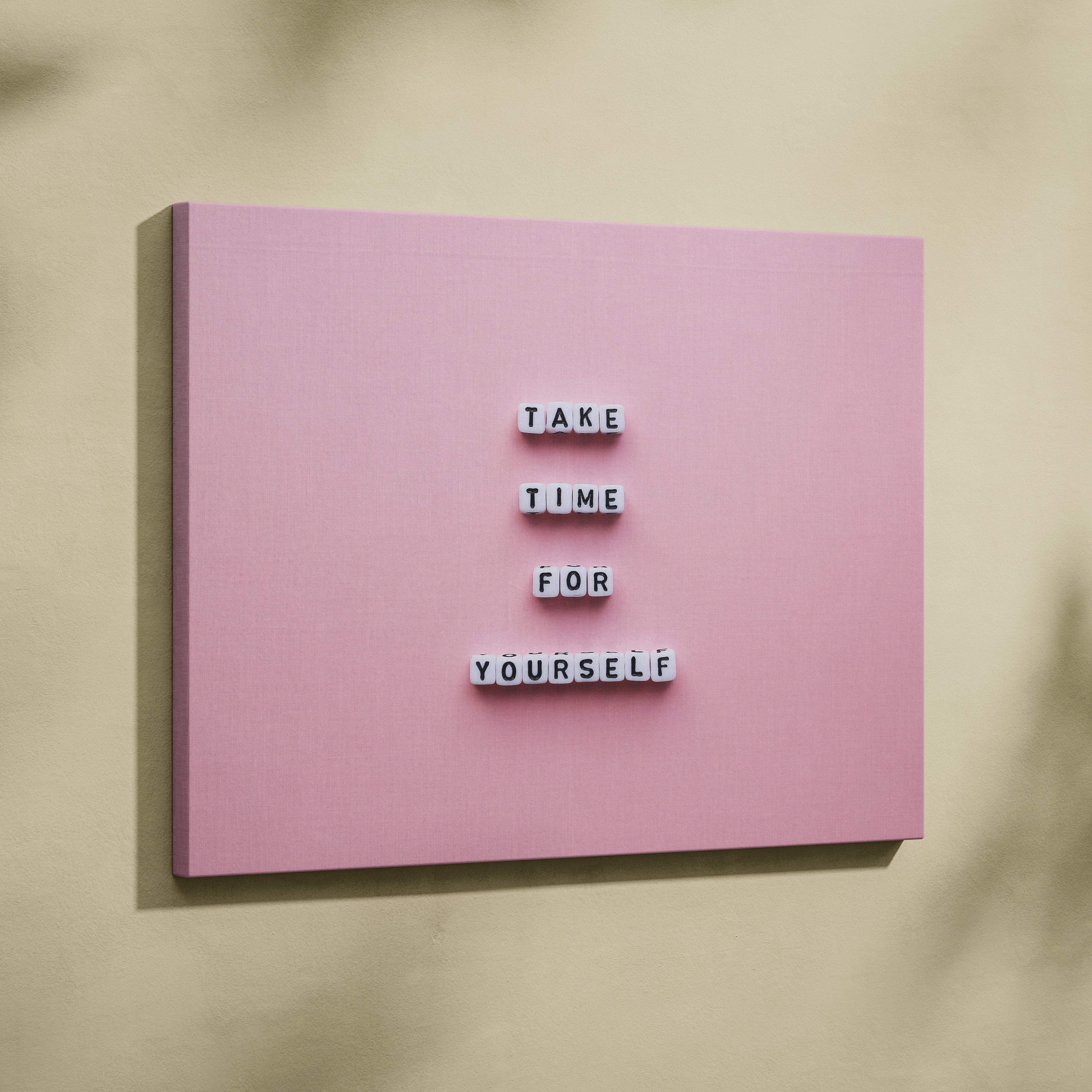 Pink rectangular letter board with white tiles spelling take time for yourself motivational minimalist wall art decor