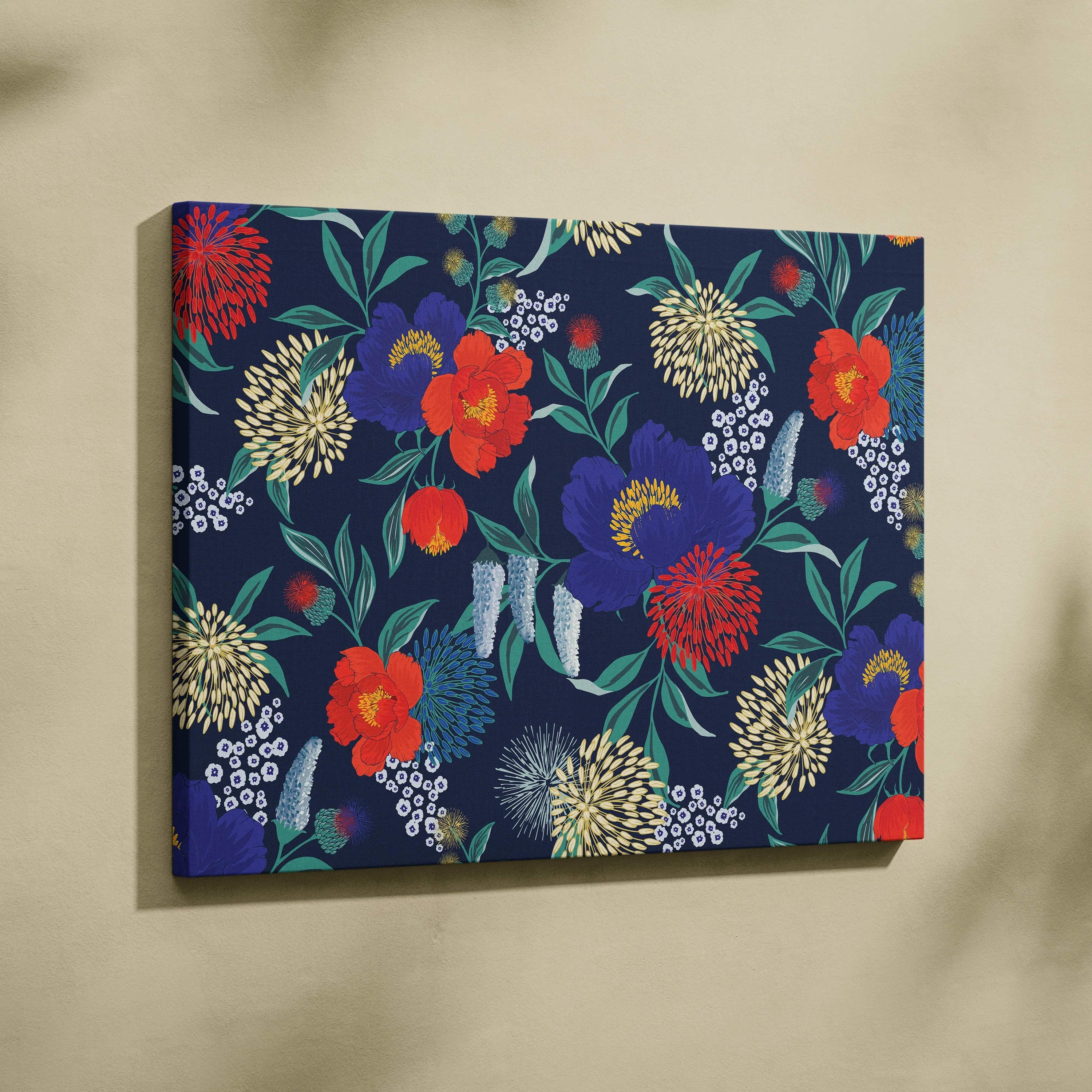 Bold floral canvas wall art with vibrant red, purple, yellow blossoms on navy