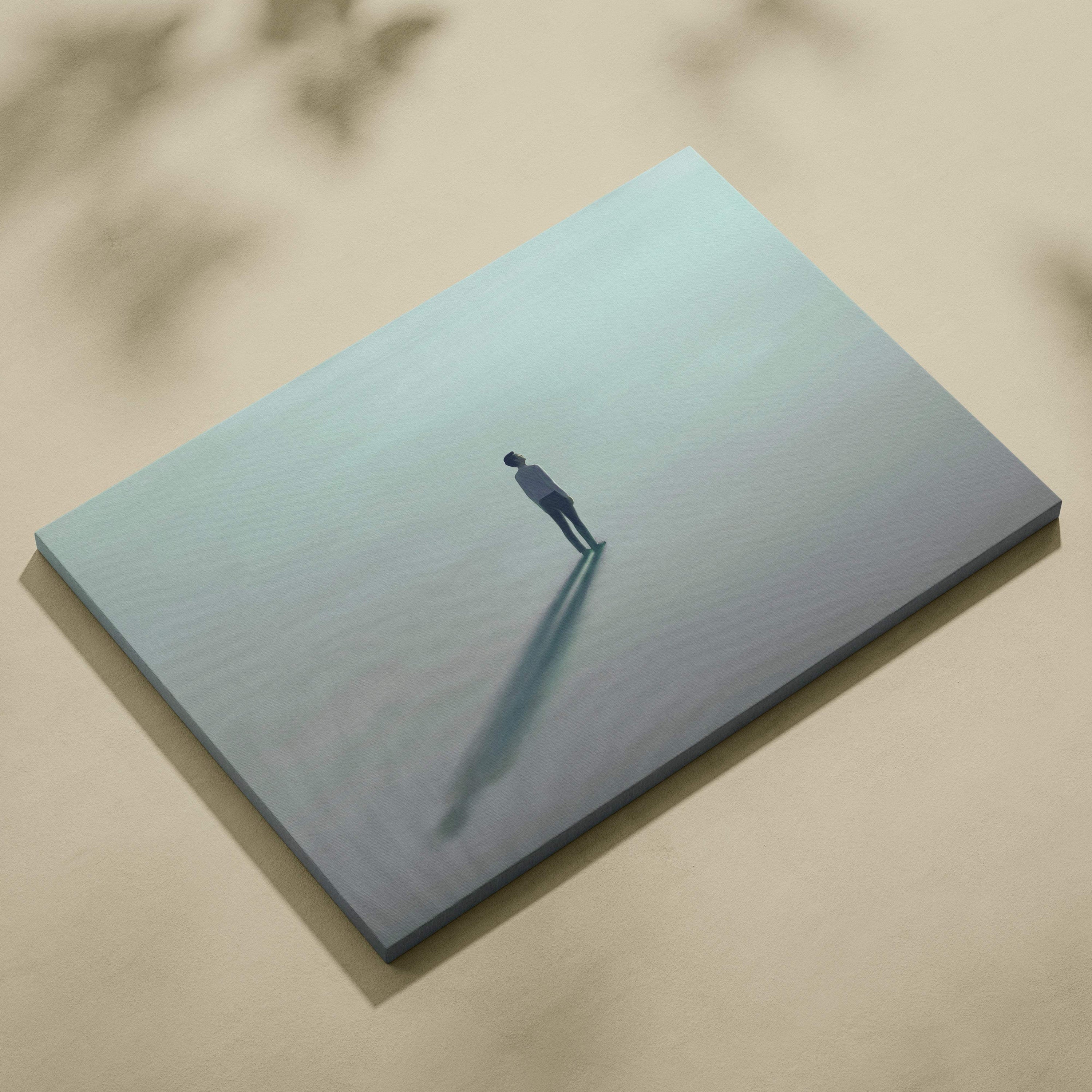 Contemporary lone man canvas wall art with muted tones and minimal aqua fog landscape for bedroom decor
