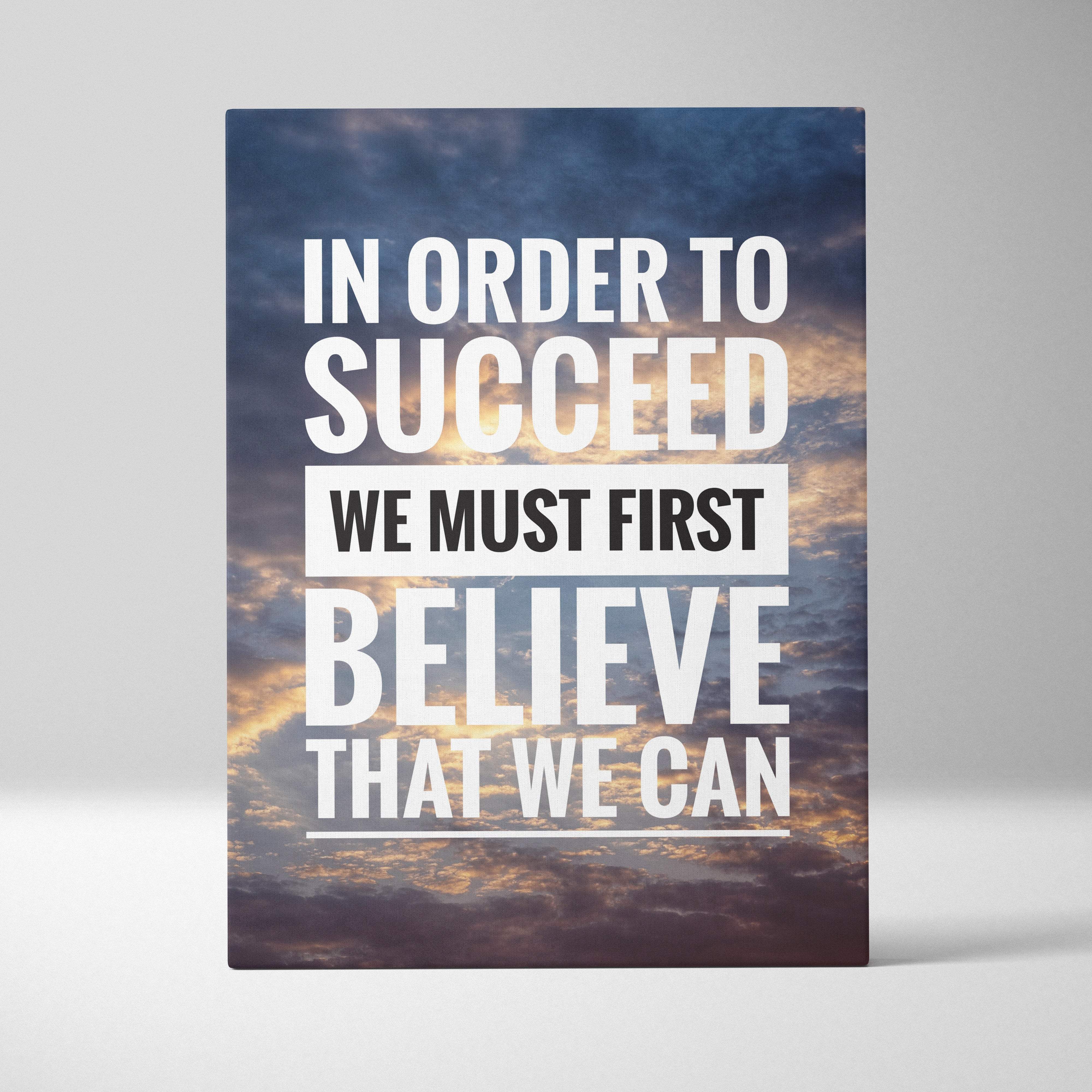 A rectangular motivational canvas print with bold white and black lettering on a dramatic sky background for office or home decor