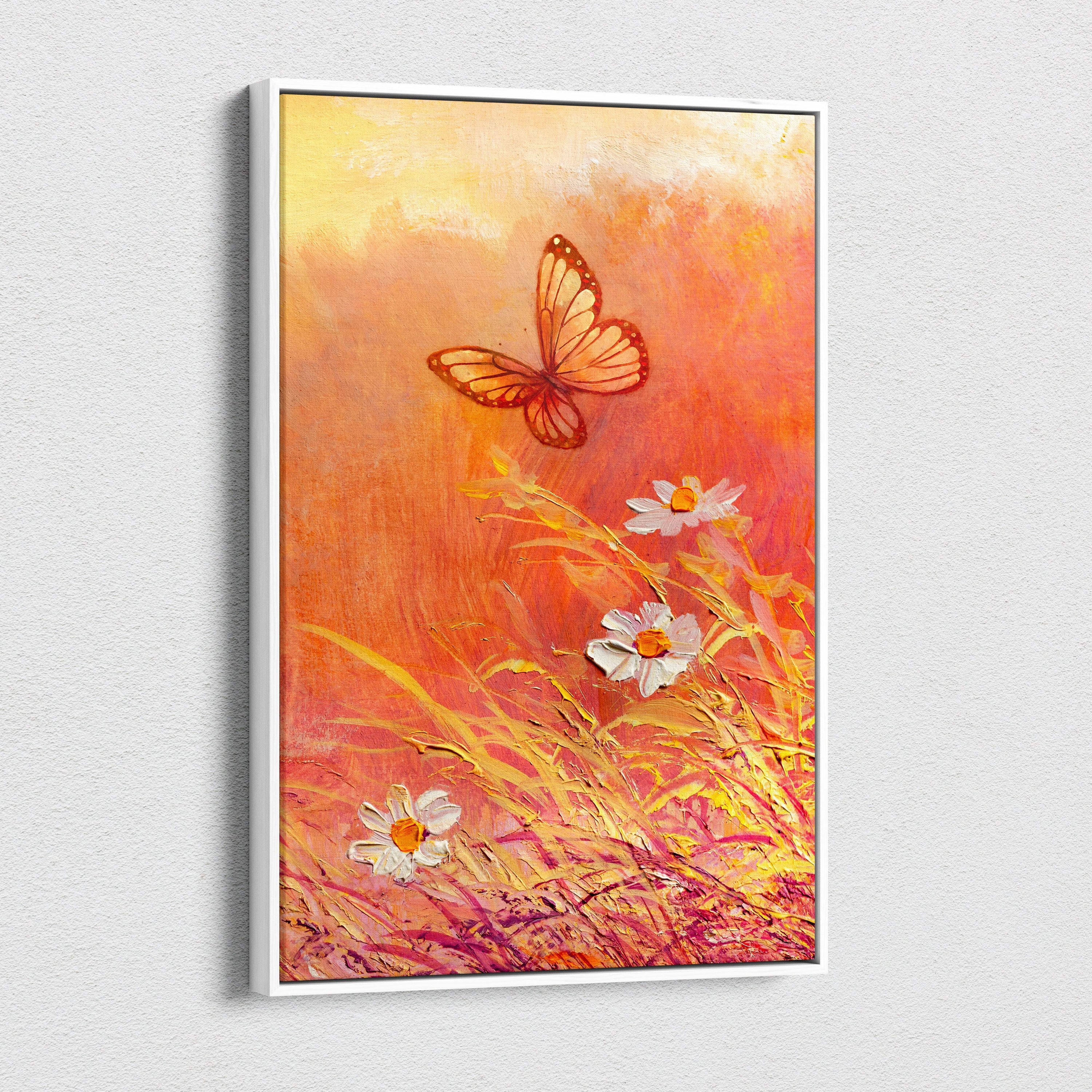 A framed butterfly and wildflower canvas print with orange and yellow sunset, white daisies, and an amber butterfly in flight