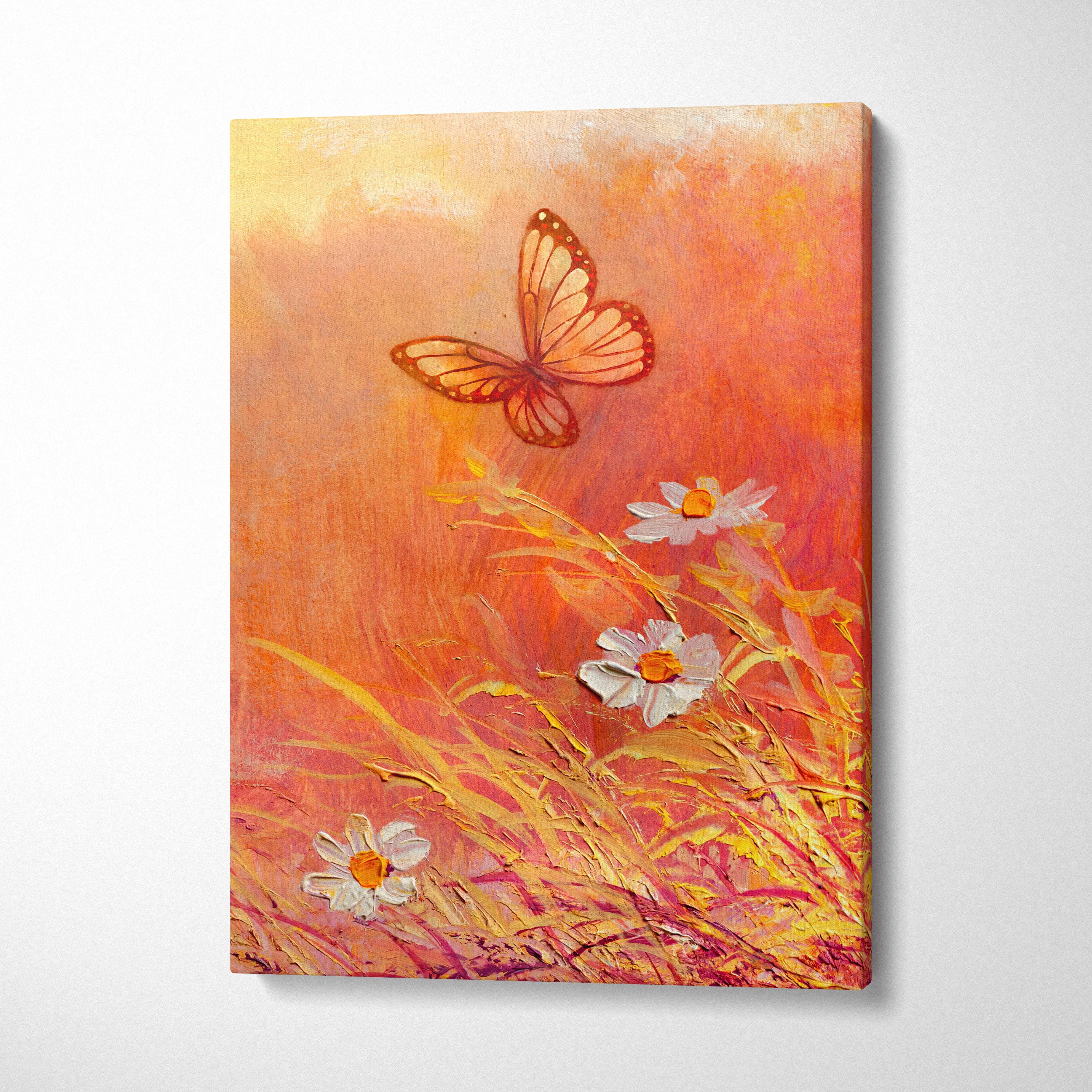 A vibrant orange and yellow butterfly and wildflower canvas print featuring translucent wings above white daisies in golden grass