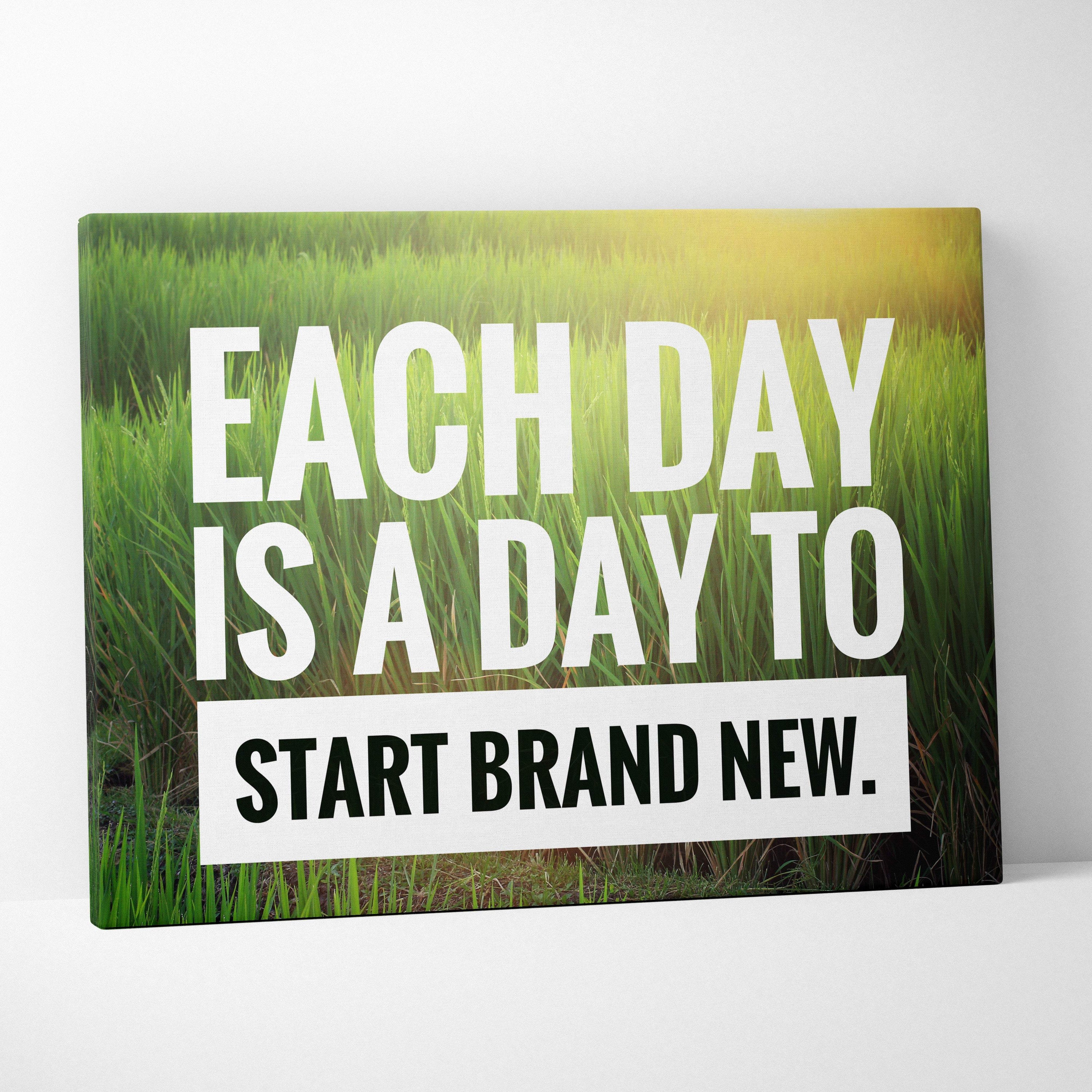 Motivational nature canvas wall art with bold white and black text on vibrant green grass background with yellow glow