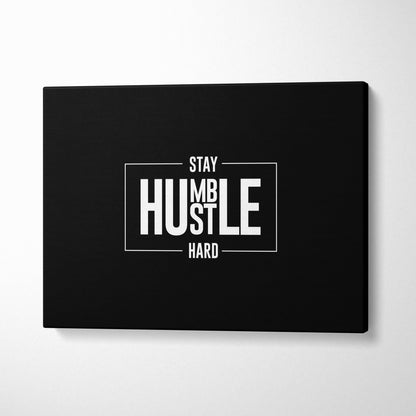 Black canvas print with white stay humble hustle hard text in minimalist frame motivational office wall art