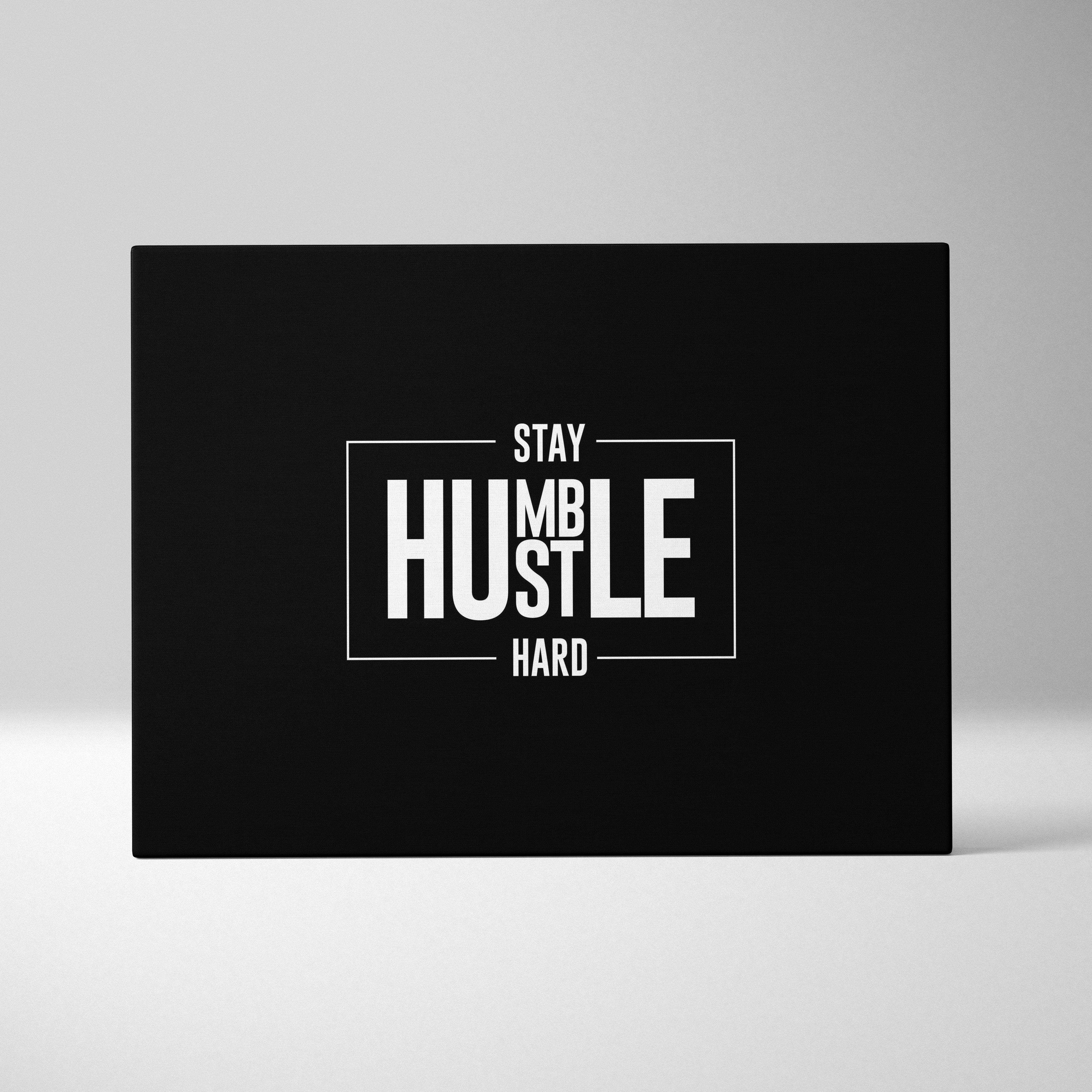 Black canvas print featuring white stay humble hard text in bold modern font minimalist rectangular frame motivational decor