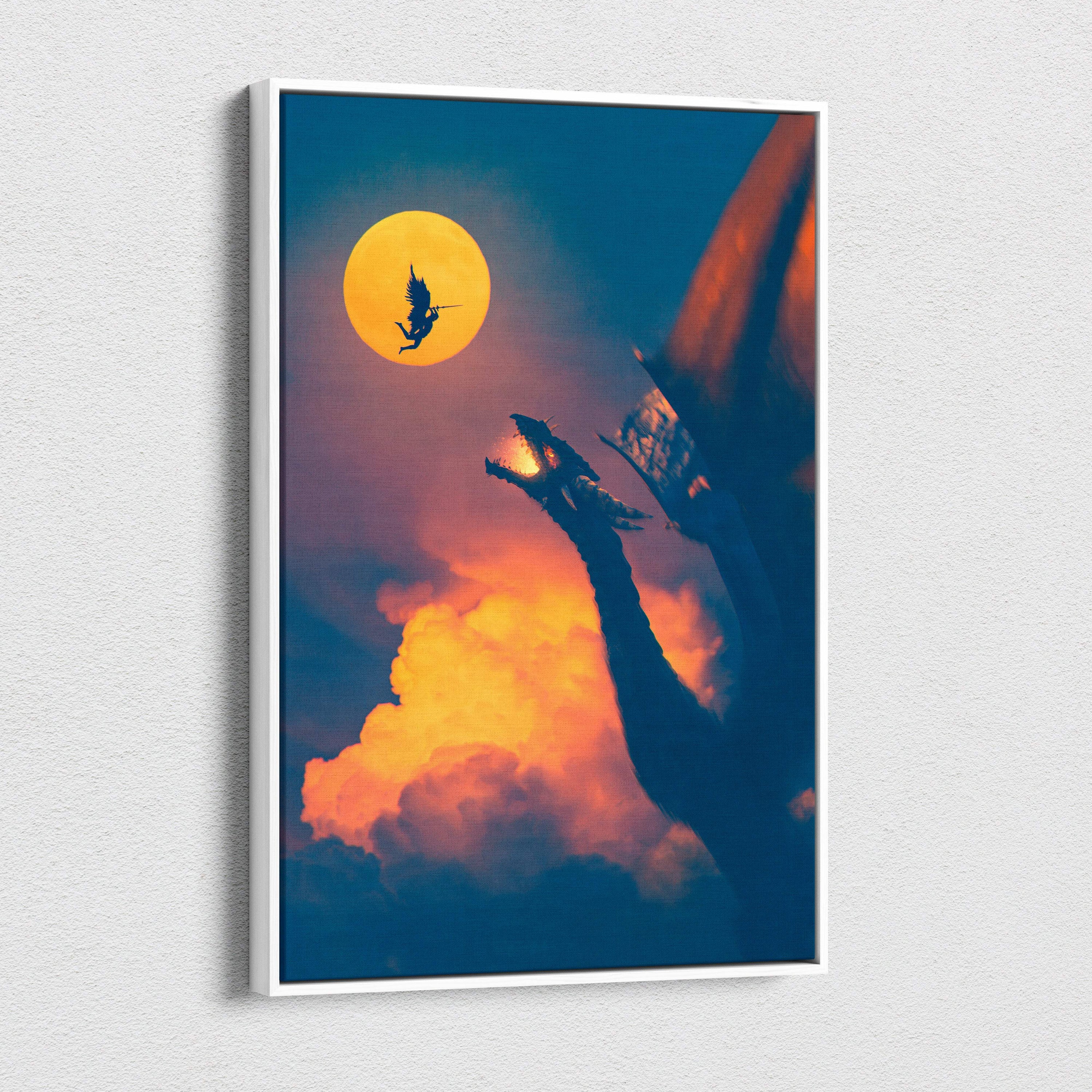 A framed canvas print showing a dramatic dragon and rider silhouette against a glowing moon and fiery orange clouds